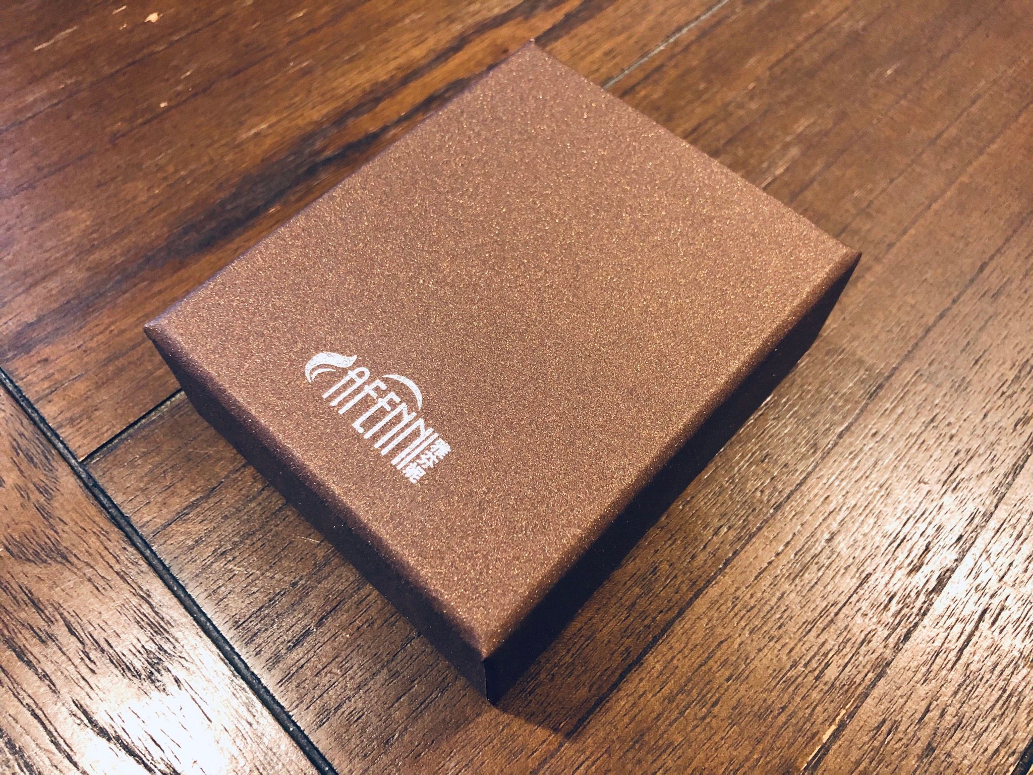 Móc treo xe tì hưu hồng ngọc