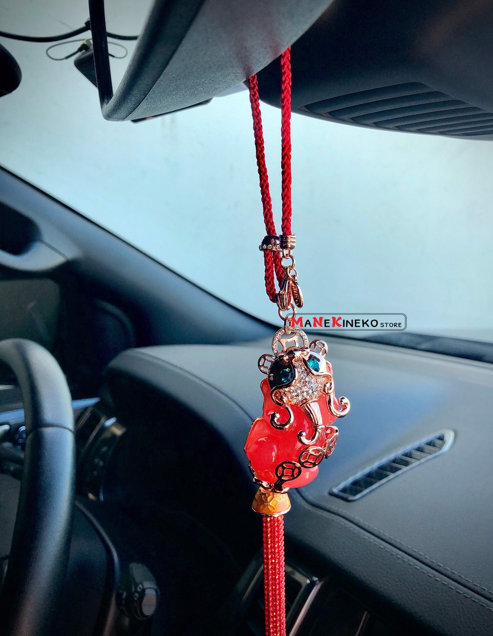 Móc treo xe tì hưu hồng ngọc