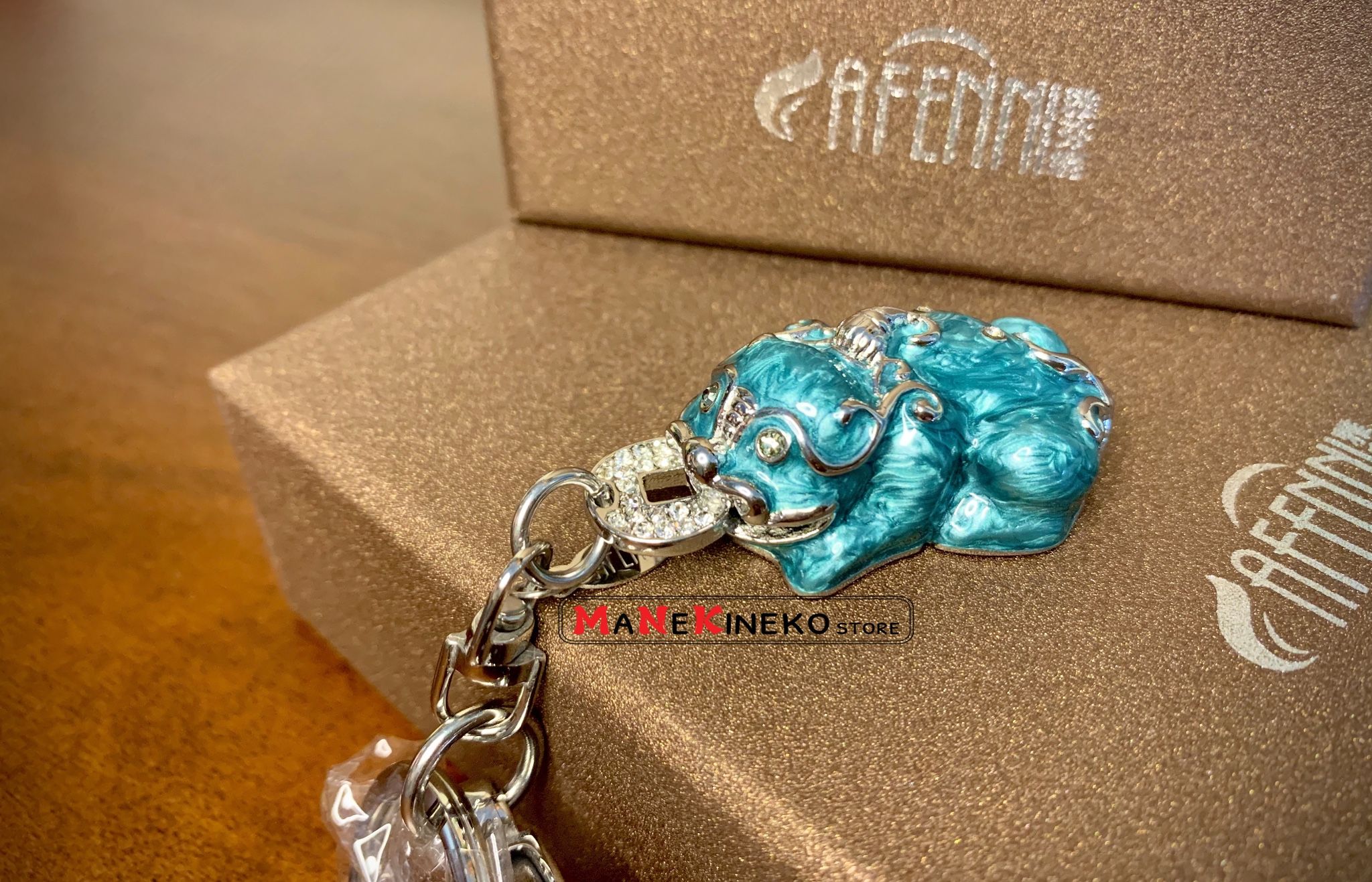 móc khoá oto tì hưu xanh ngọc