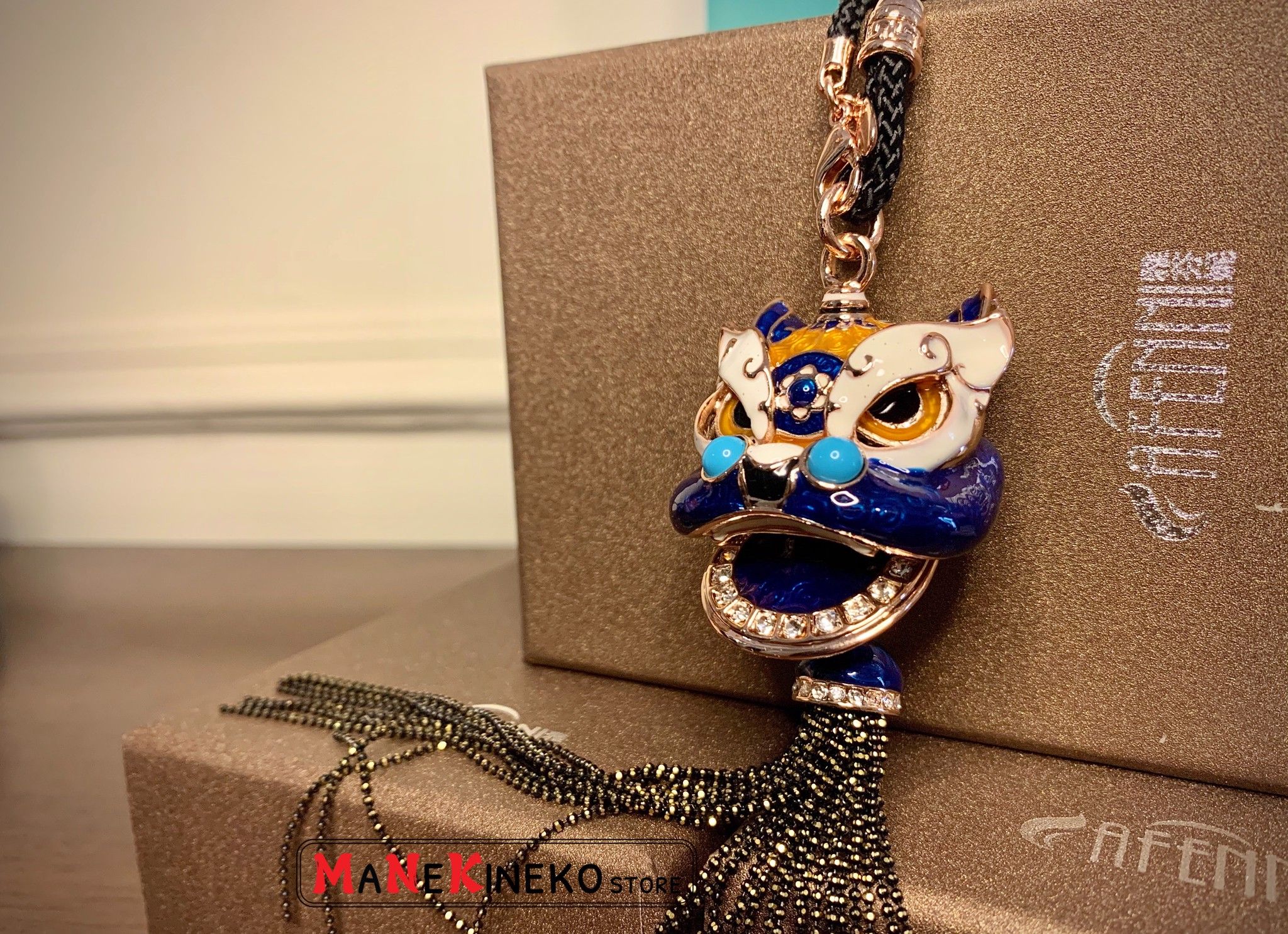 Móc treo oto đầu lân xanh