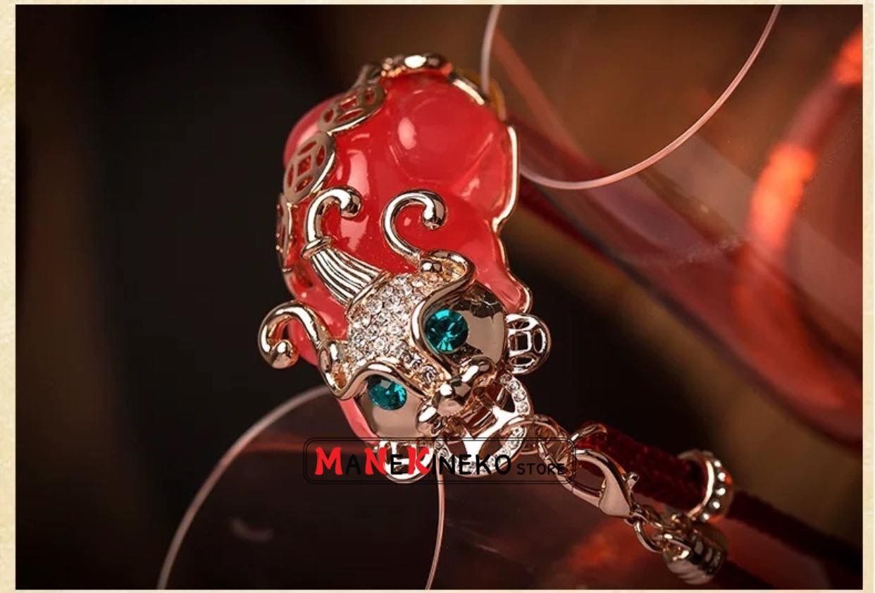 Móc treo xe tì hưu hồng ngọc