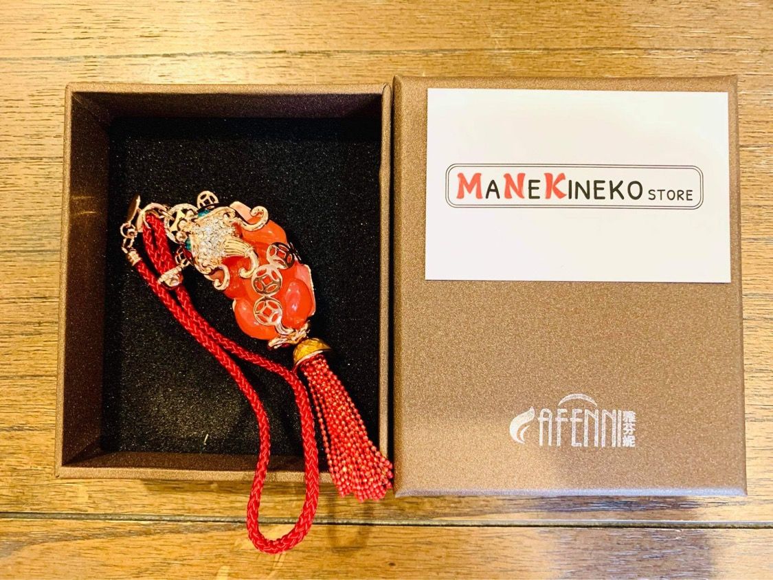Móc treo xe tì hưu hồng ngọc