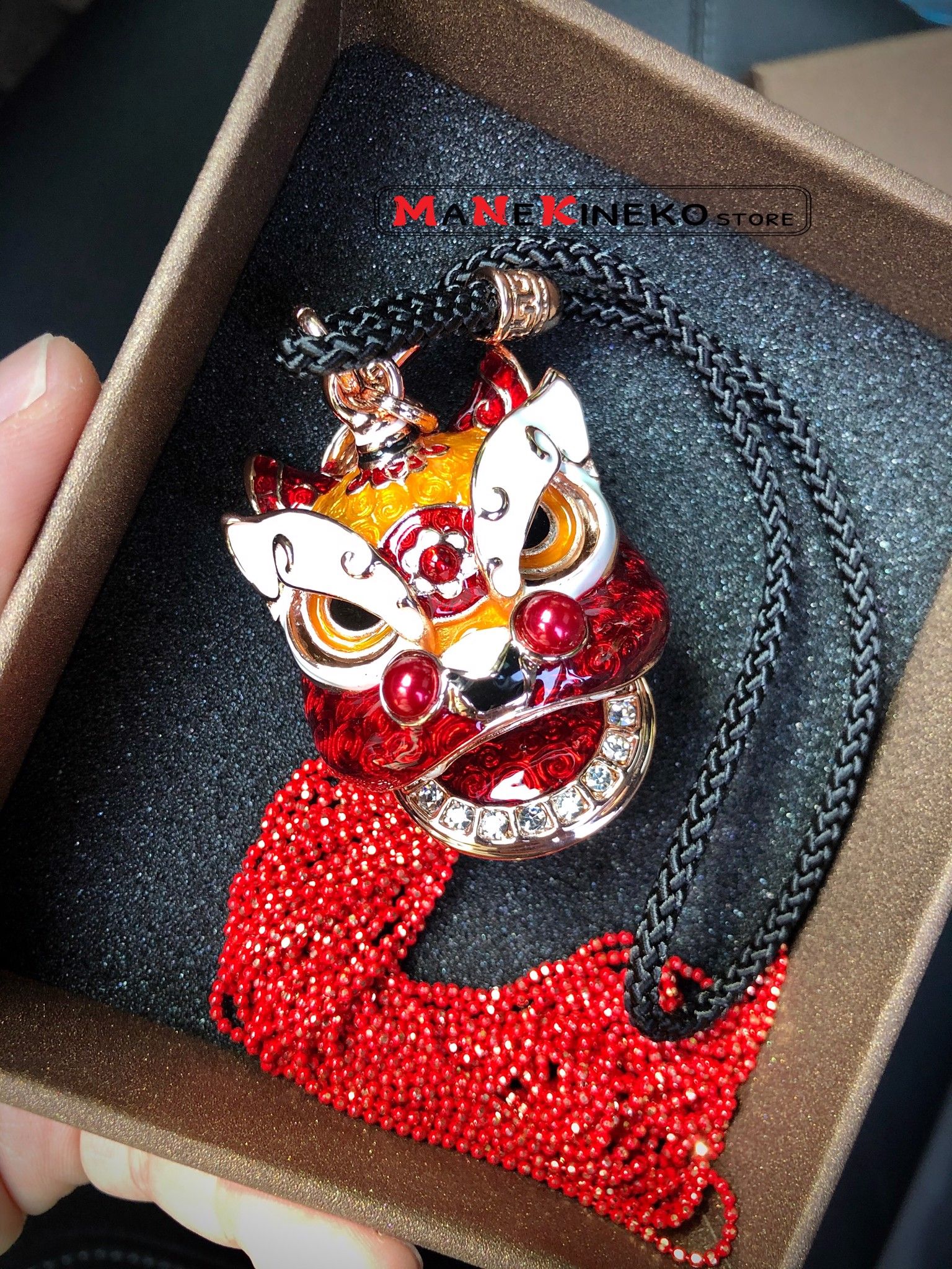 Móc treo xe oto Đầu Lân đỏ