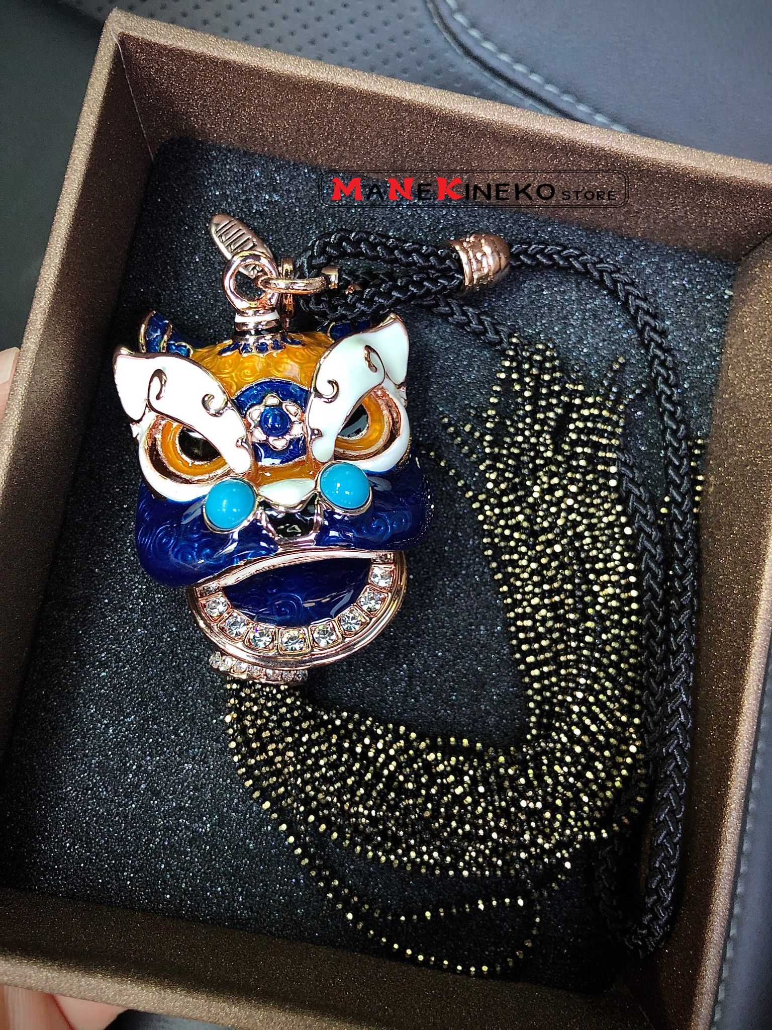 Móc treo oto đầu lân xanh