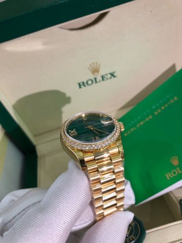 Đồng hồ nữ rolex* dây kim loại mặt xanh viền kim cương si vàng case 31mm