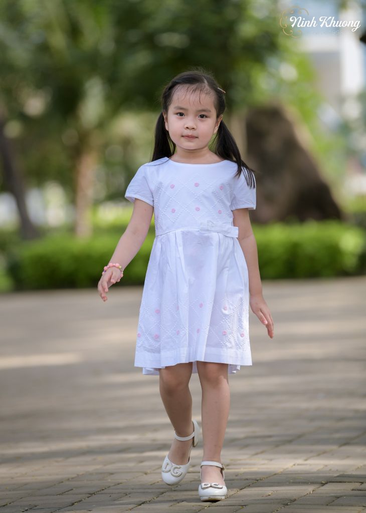 Đầm rua hình thoi cổ viền nơ eo