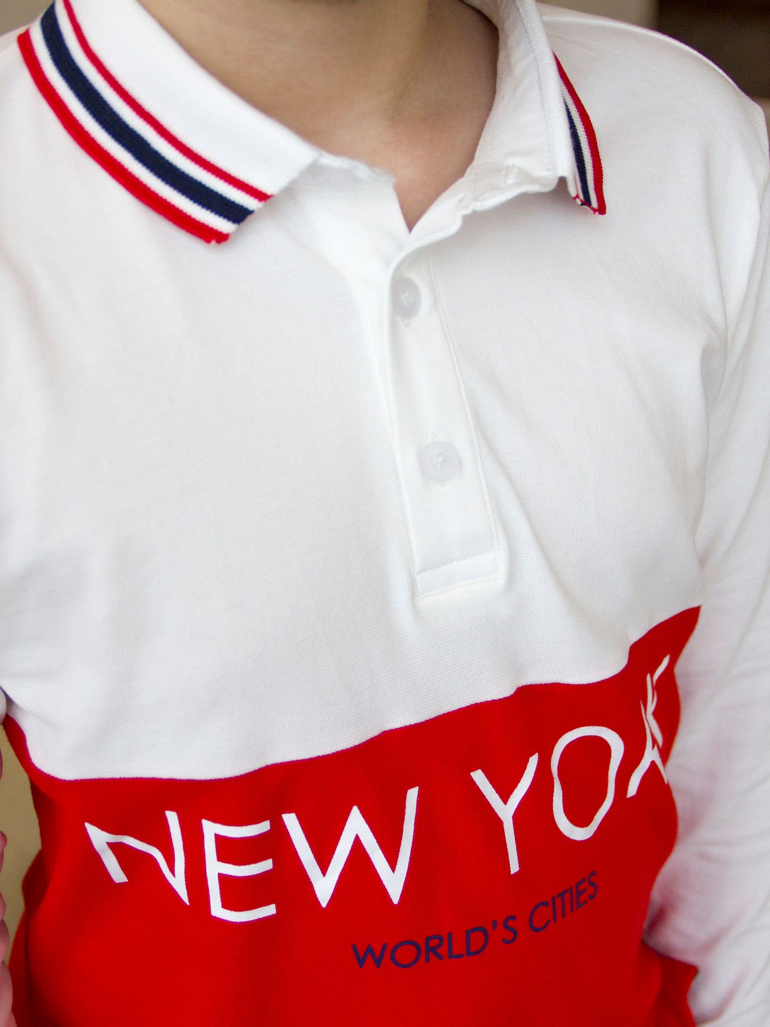 Áo polo dài tay bé trai đỏ trắng in chữ New York - Blue Seven