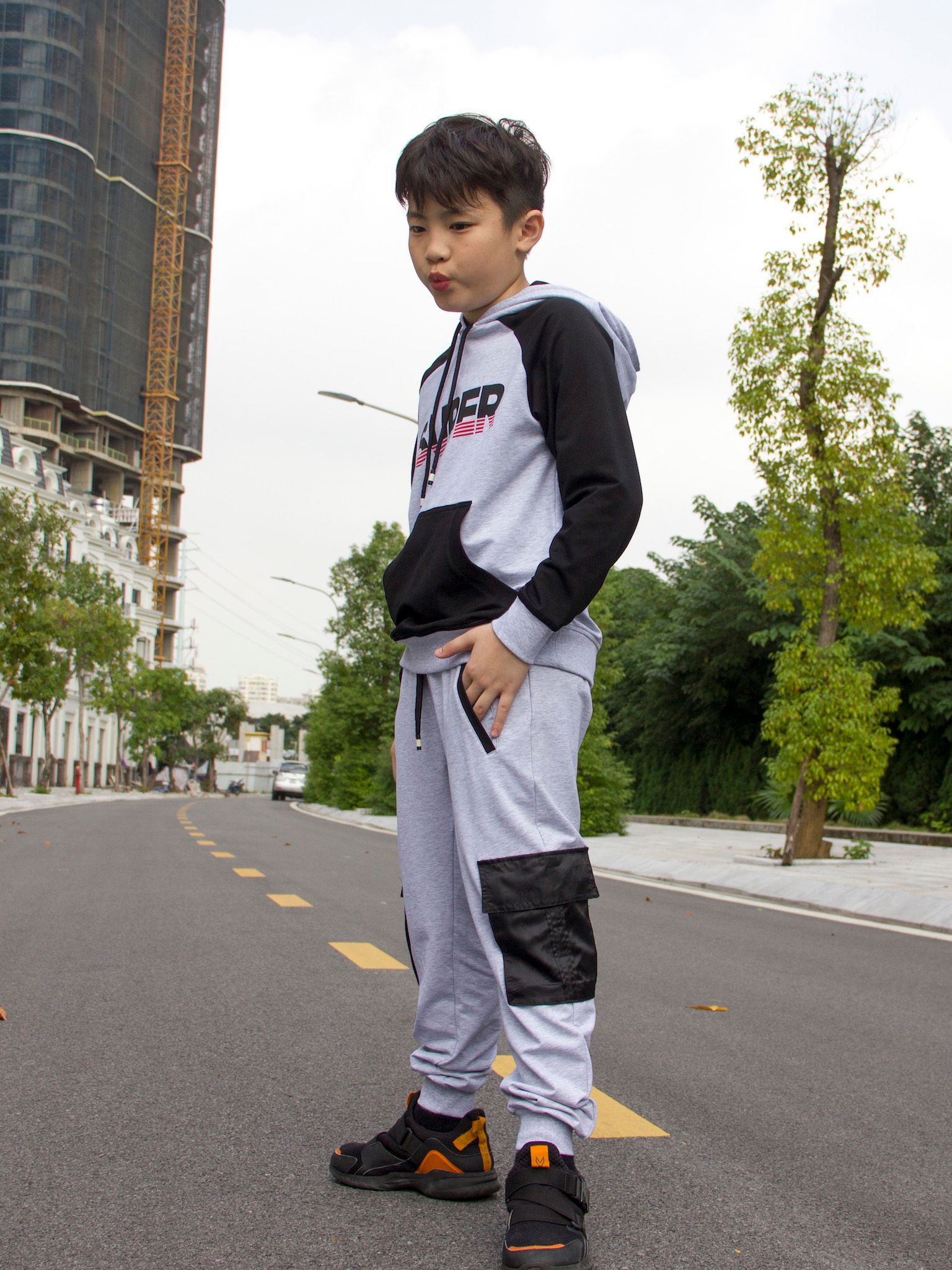 Áo nỉ mũ bé trai tay jaclang in chữ SUPER - Blue Seven