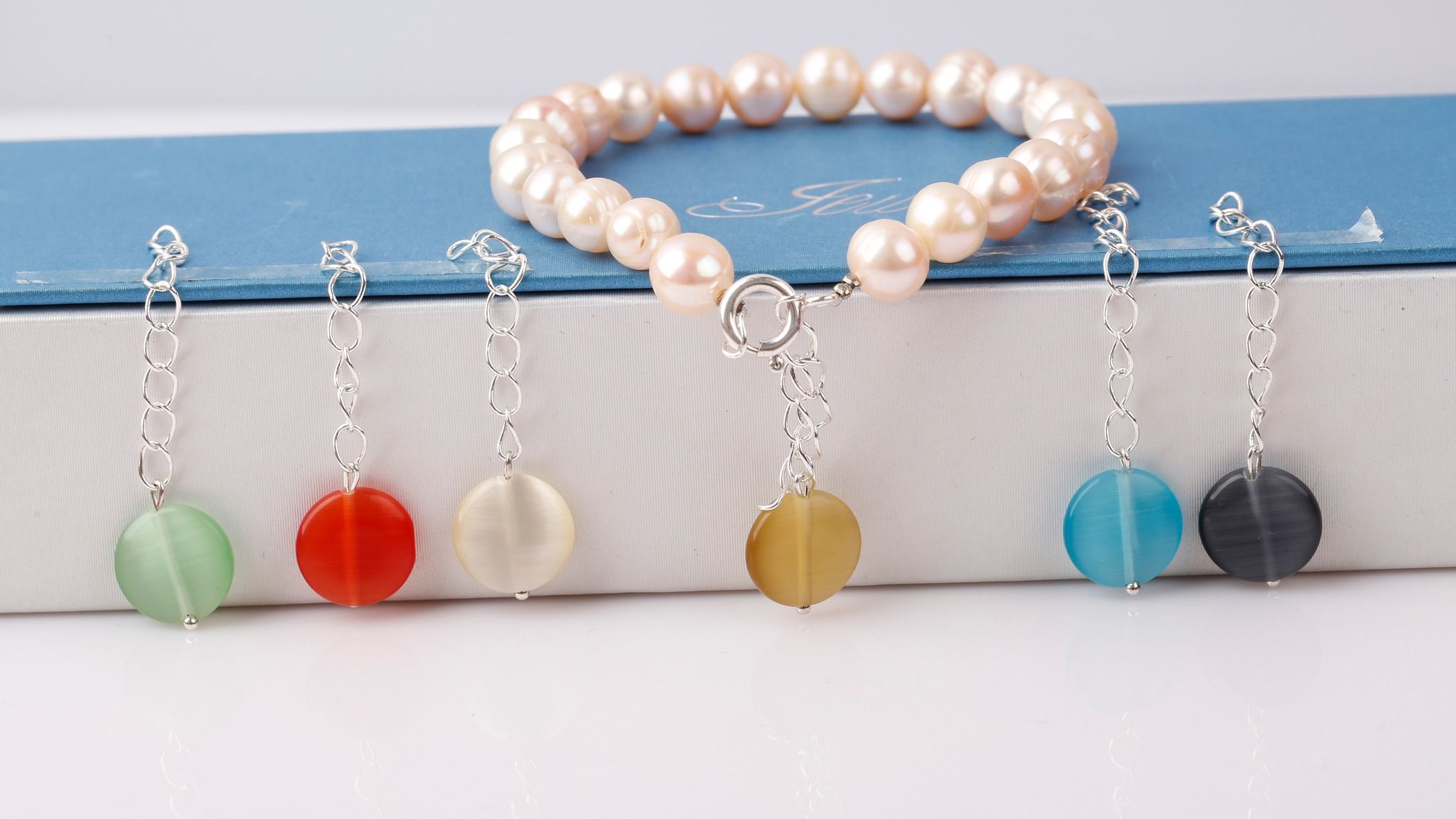 VÒNG TAY NGỌC TRAI GẮN ĐÁ PHONG THỦY THƯƠNG HIỆU OPAL