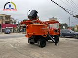 Máy trộn bê tông tự cấp liệu Hồng Hà 18 bao 2 cầu