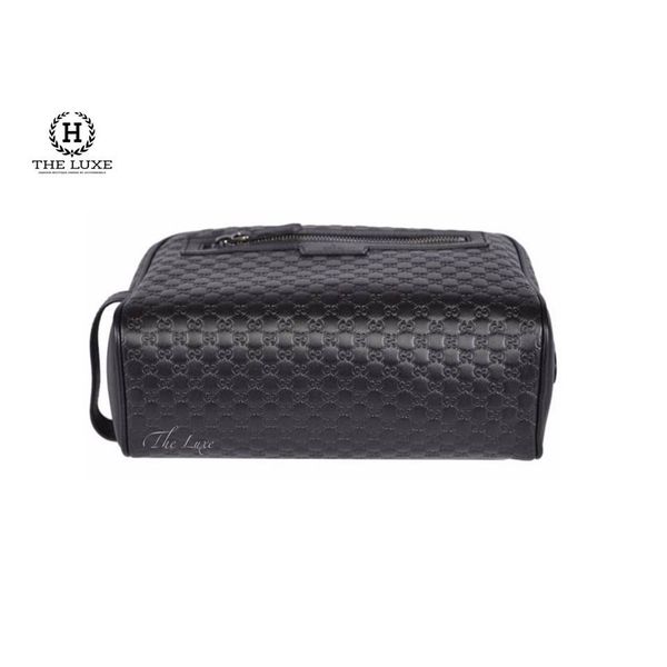 Clutch Gucci Toipetry vân monogram đen