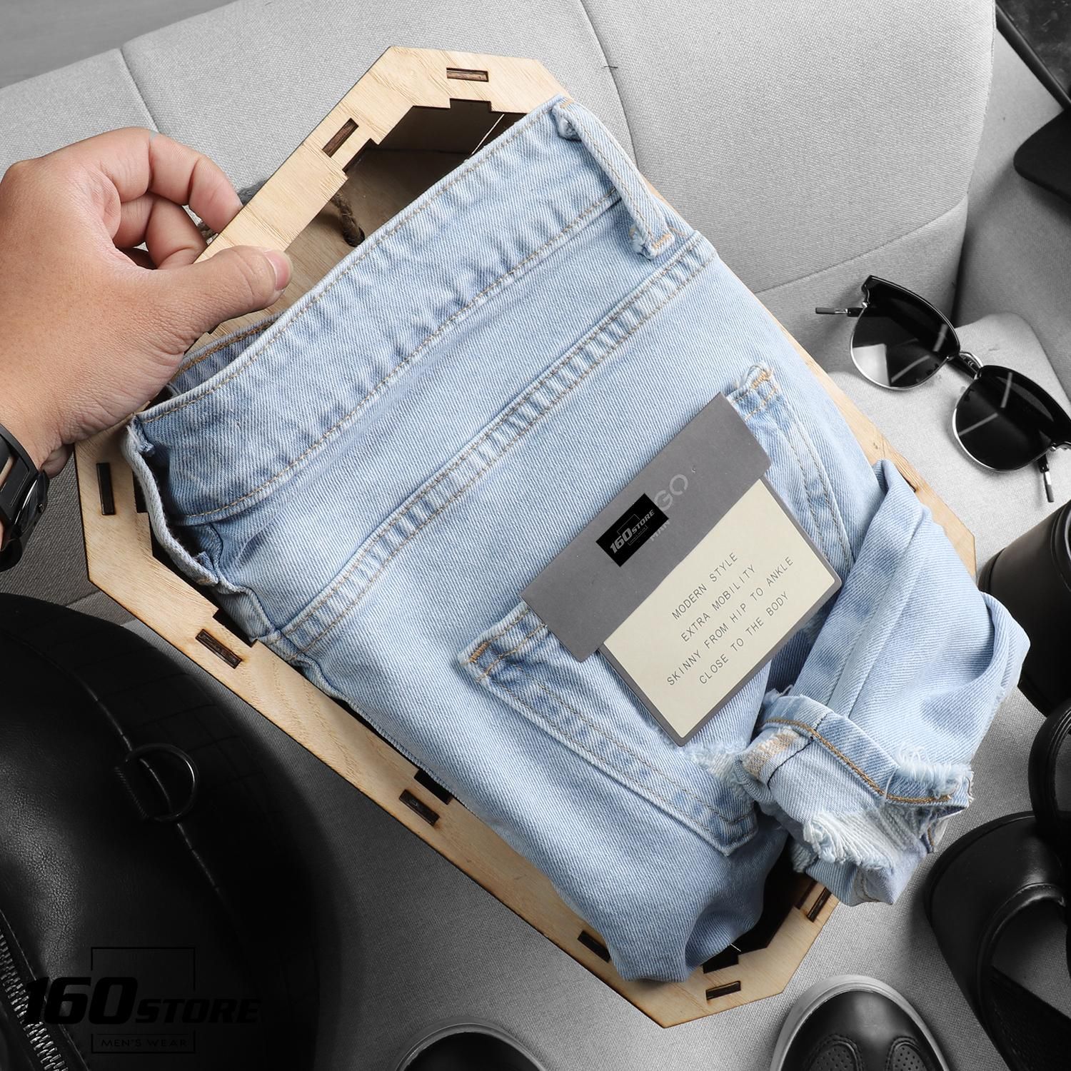 Quần jean M.N.G light blue ripped