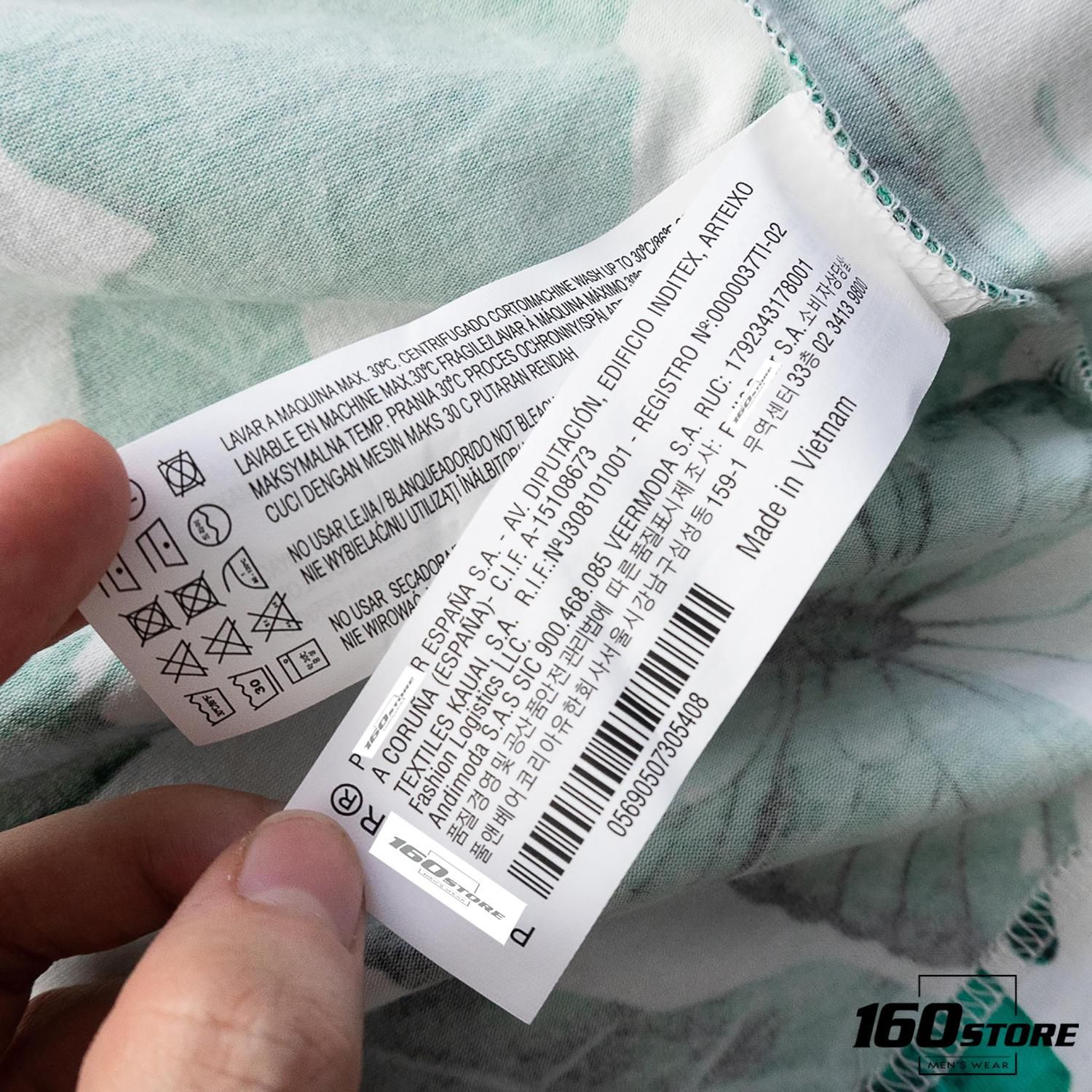Áo Polo P.B cổ vest họa tiết