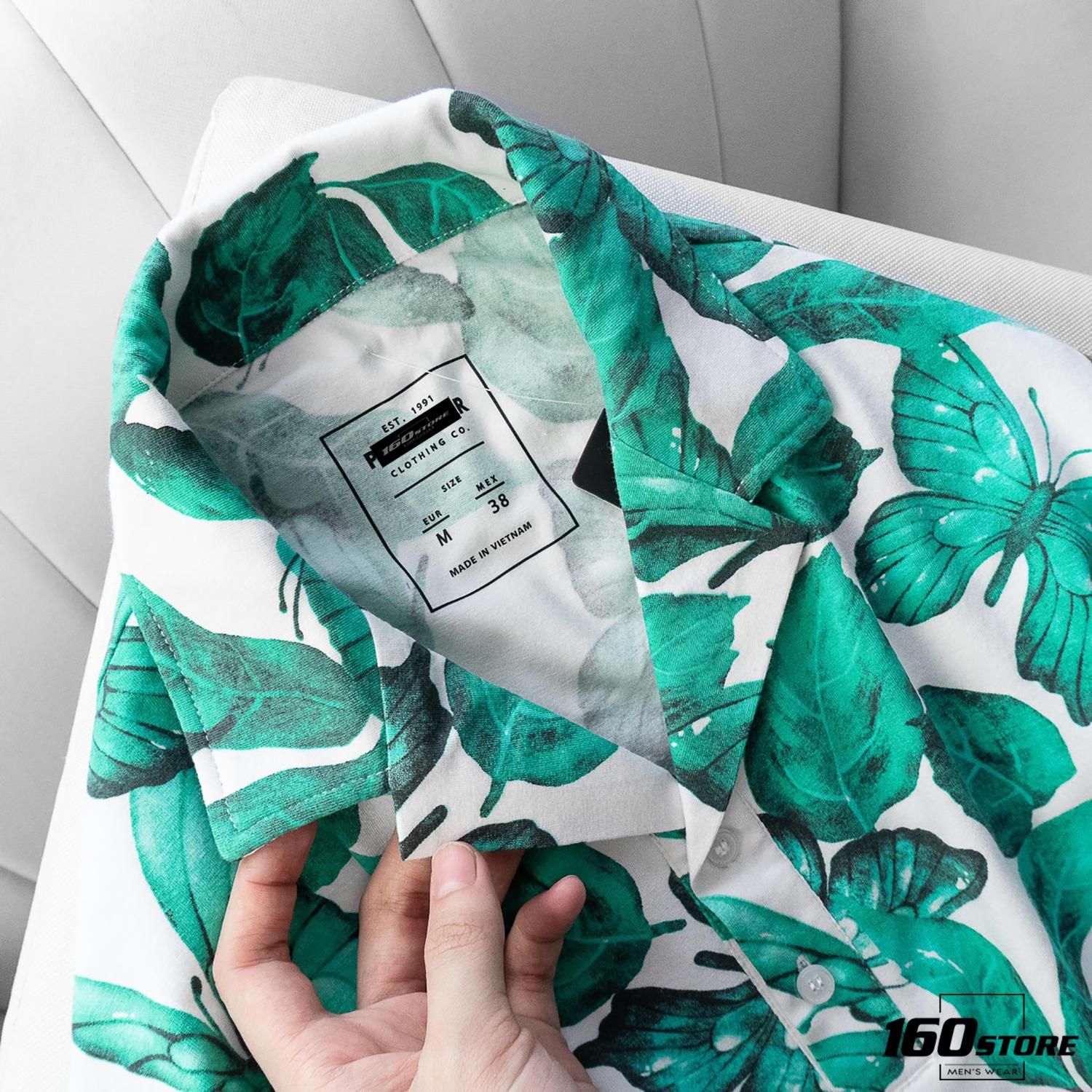 Áo Polo P.B cổ vest họa tiết