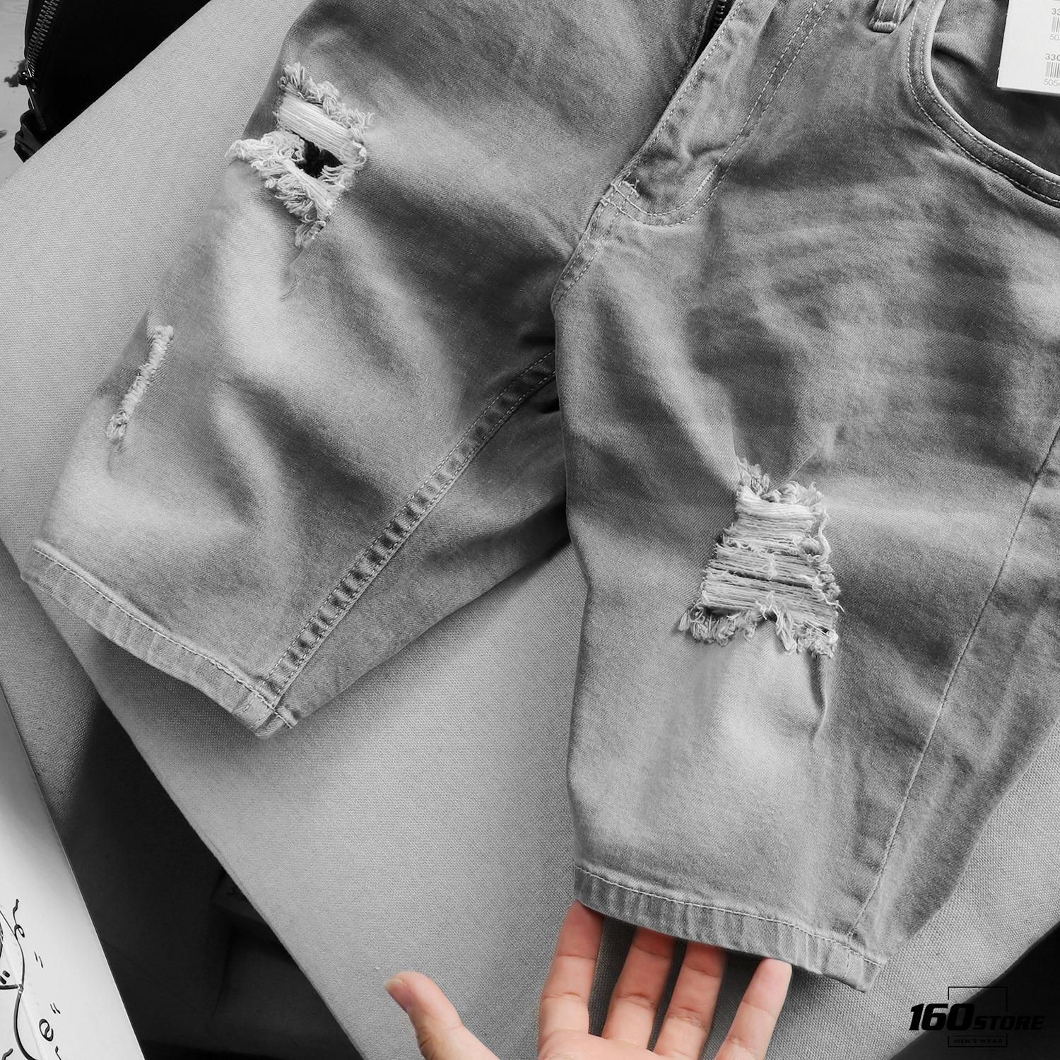 Quần short jeans T.MAN rách