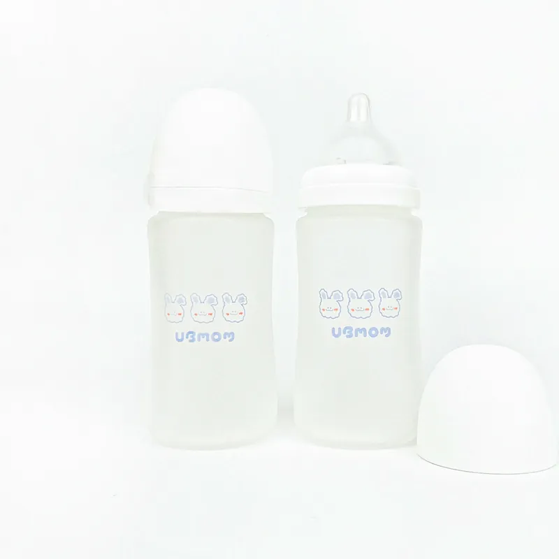 Bình Sữa Thủy Tinh Ubmom Phủ Silicone Kèm Núm - Màu Trắng