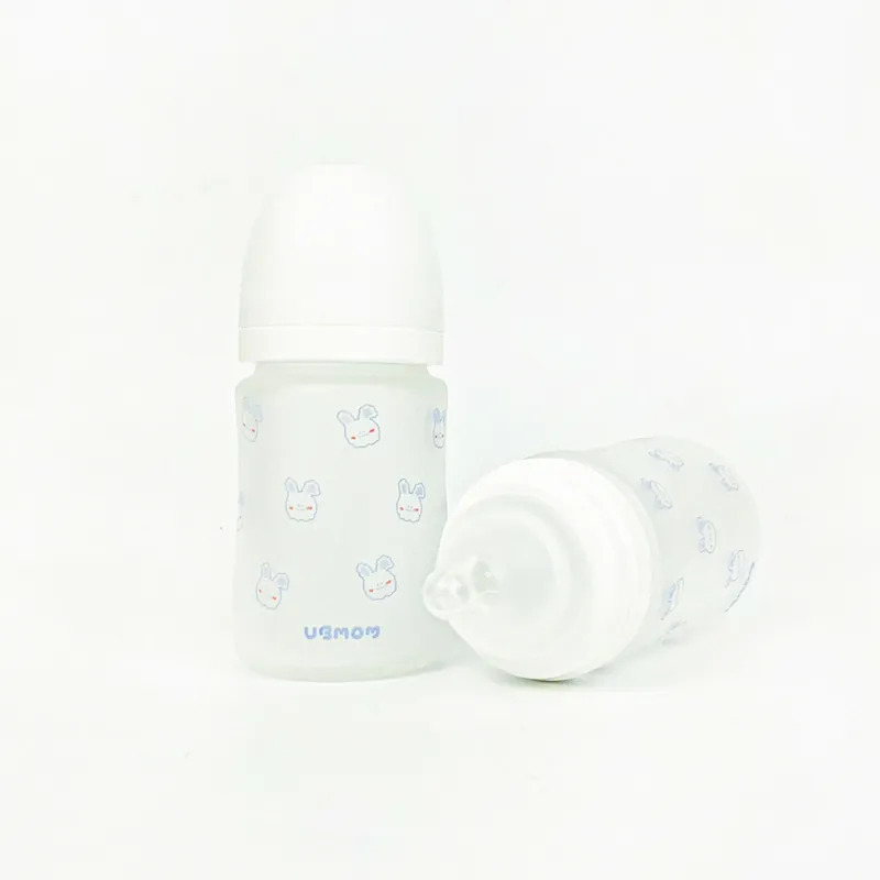 Bình Sữa Thủy Tinh Ubmom Phủ Silicone Kèm Núm - Màu Trắng