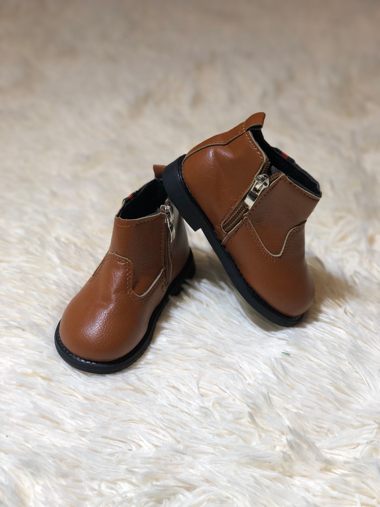 Boot da trơn Gucci