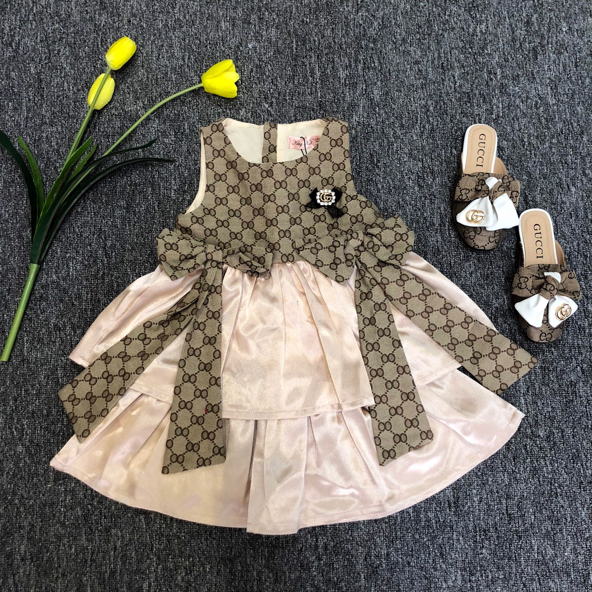 Váy nơ gucci phối tầng vải lụa