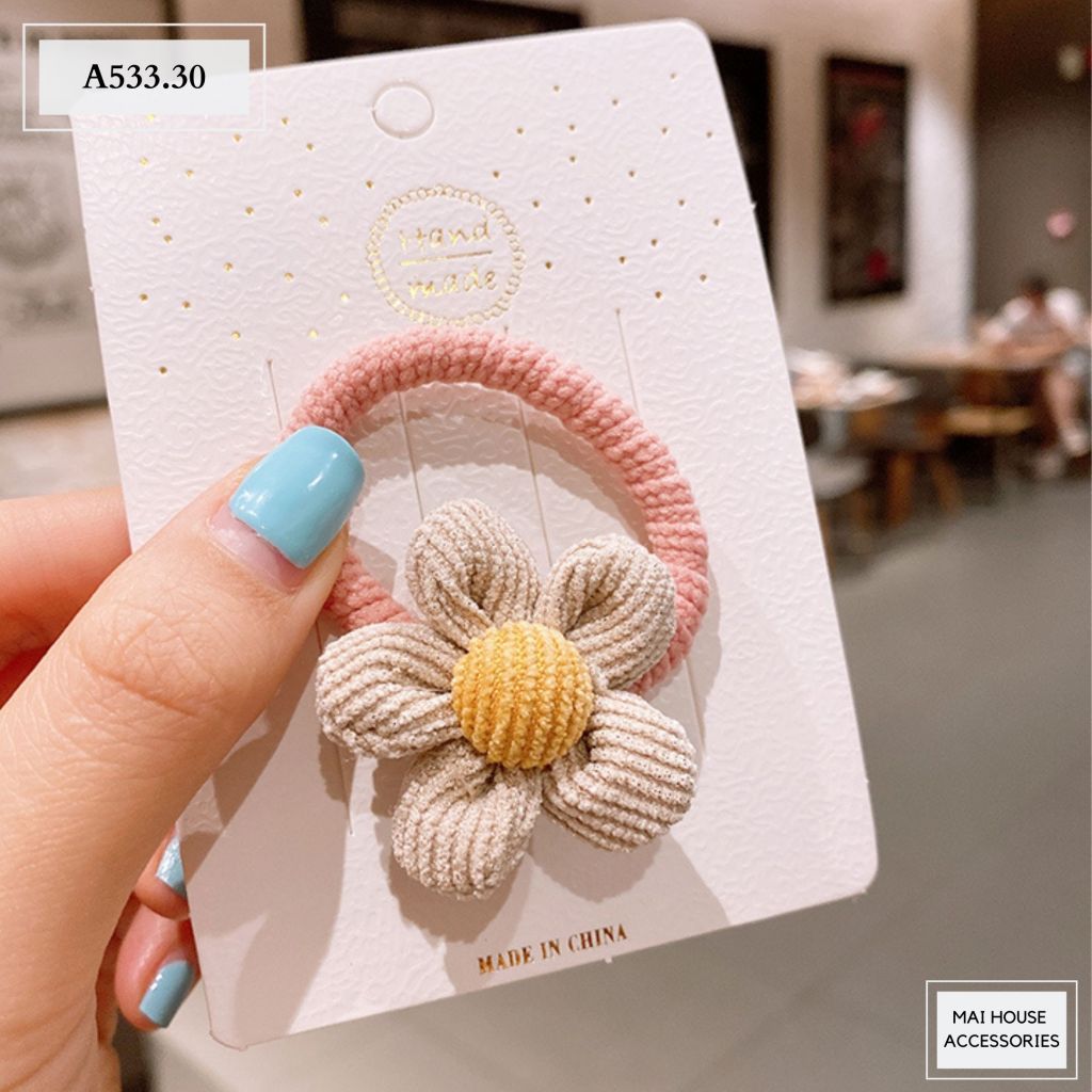 CỘT TÓC NHIỀU KIỂU DÁNG - A533