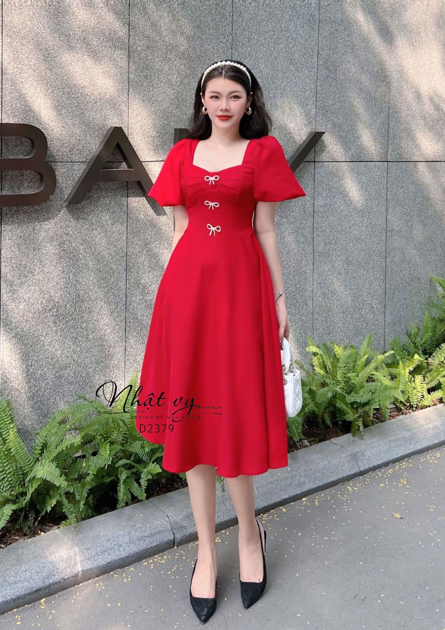 Đầm dáng xòe xếp ly ngực đính nơ tay phồng - D2379