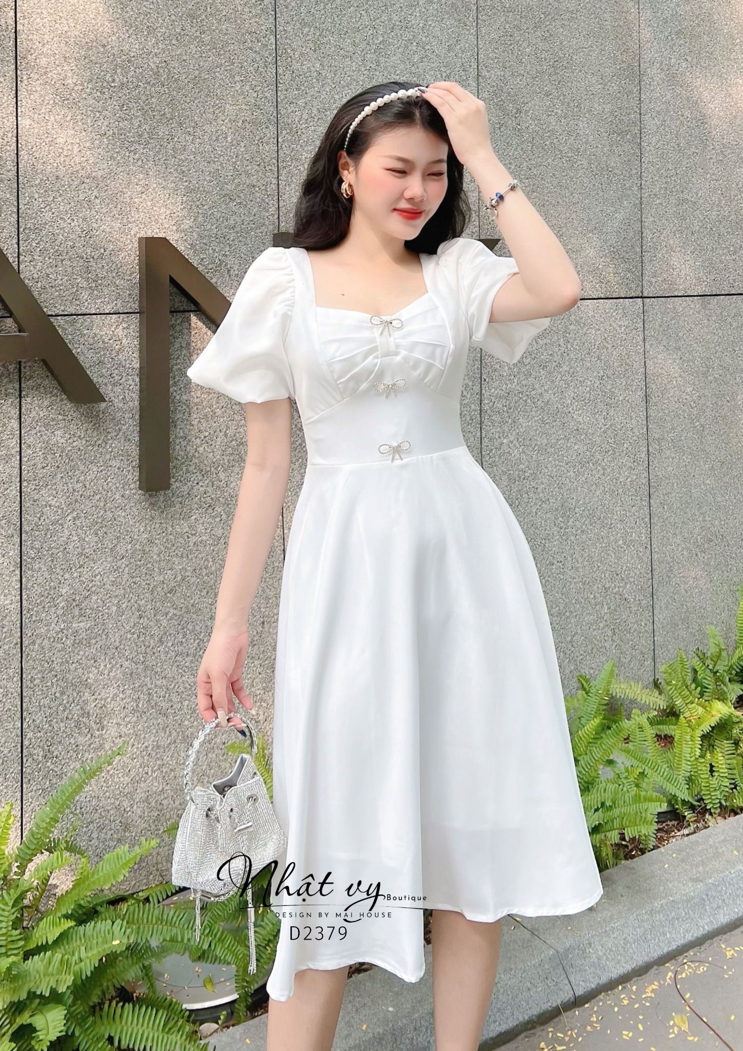 Đầm dáng xòe xếp ly ngực đính nơ tay phồng - D2379
