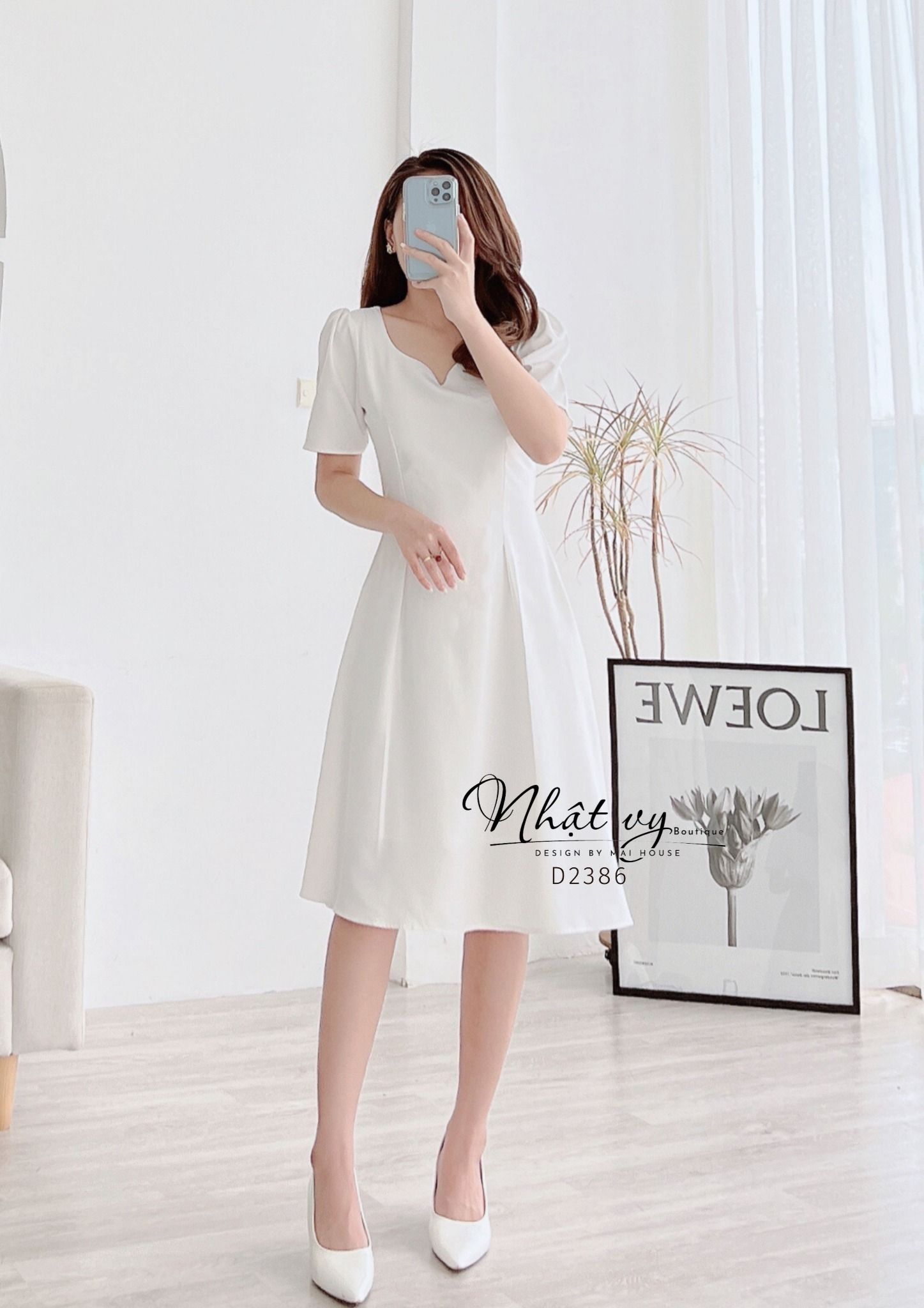 Đầm dáng xoè cổ cách điệu chiết eo tay - D2386