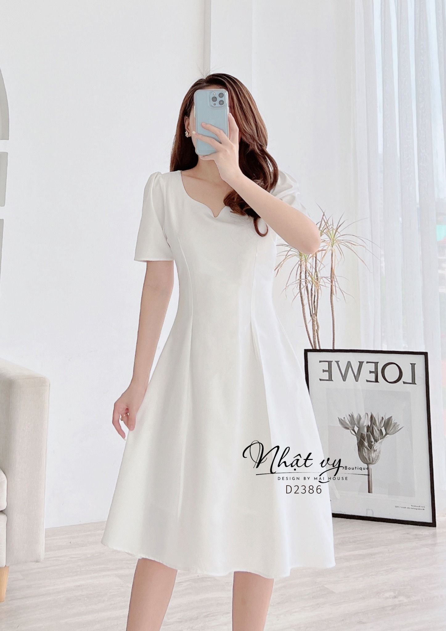 Đầm dáng xoè cổ cách điệu chiết eo tay - D2386