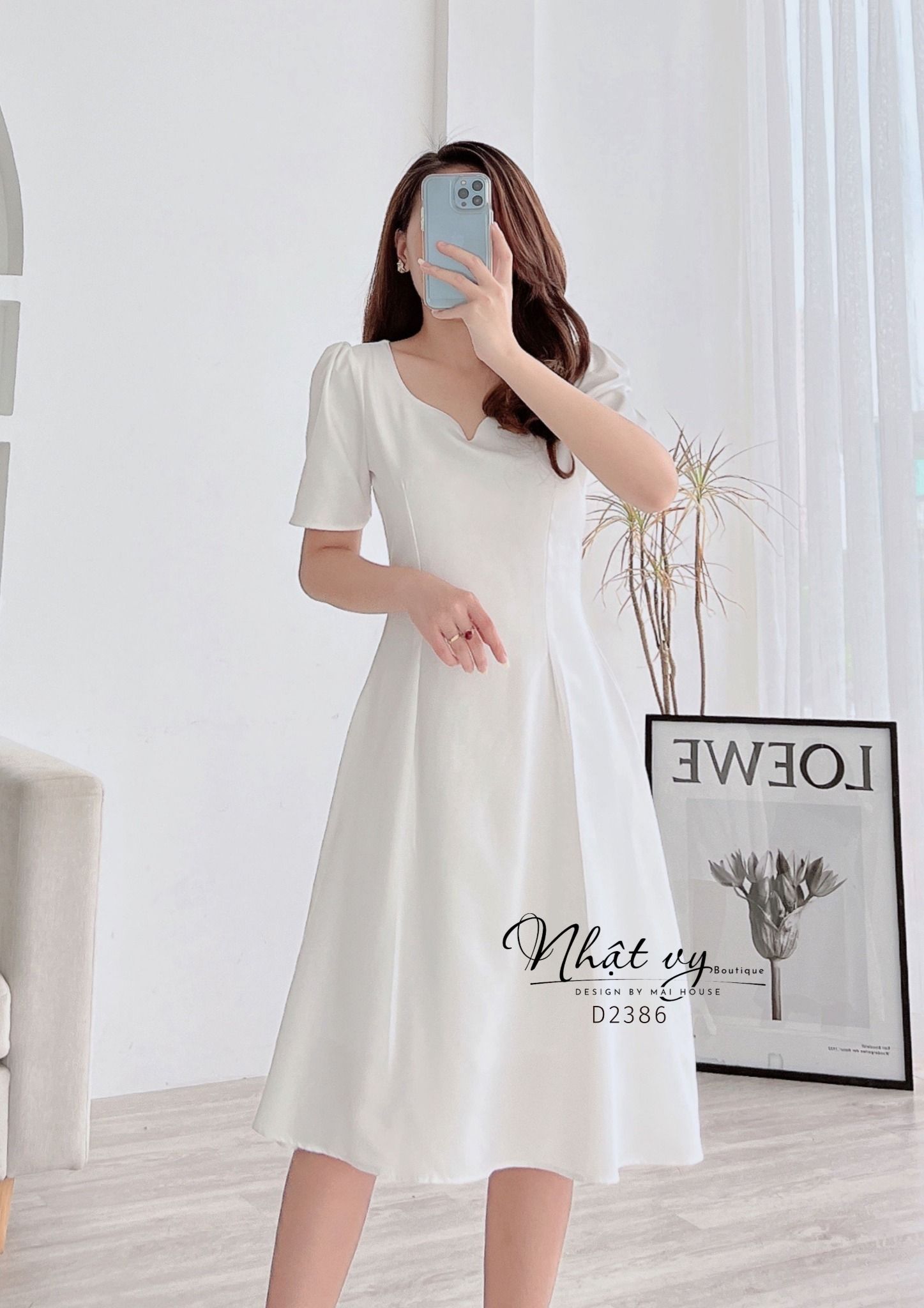 Đầm dáng xoè cổ cách điệu chiết eo tay - D2386