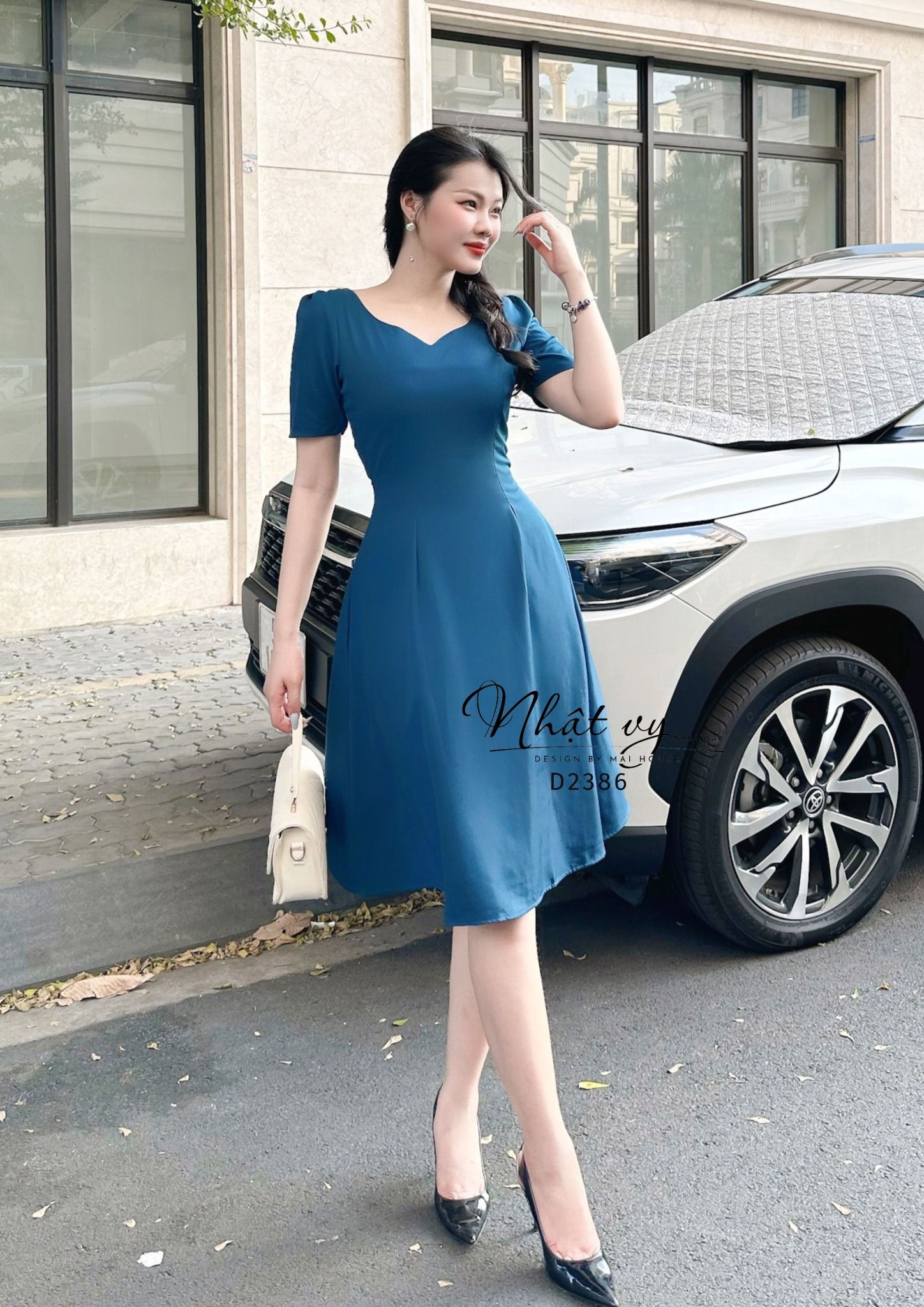 Đầm dáng xoè cổ cách điệu chiết eo tay - D2386