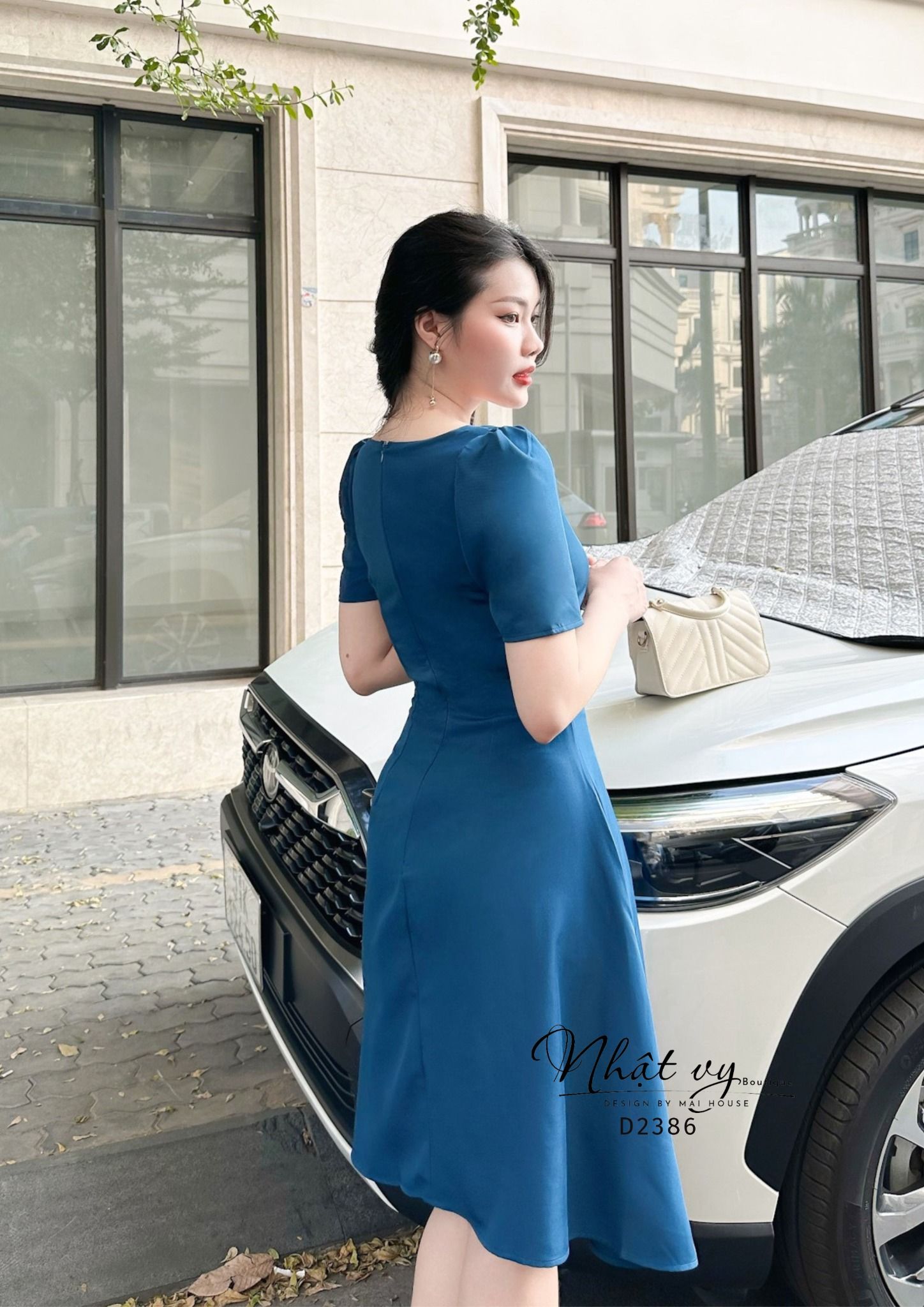 Đầm dáng xoè cổ cách điệu chiết eo tay - D2386