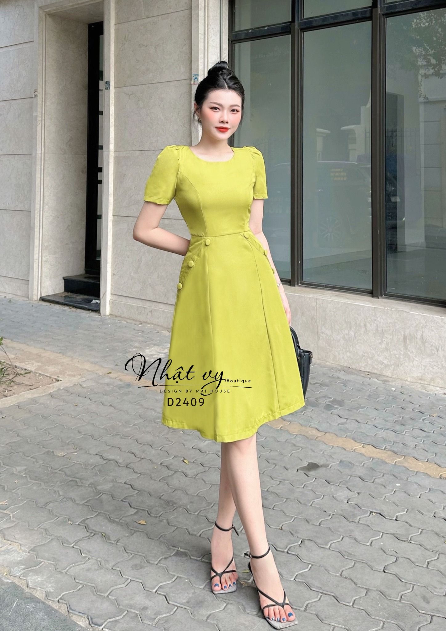 Đầm cổ tròn tay lửng phối cúc bọc - D2409