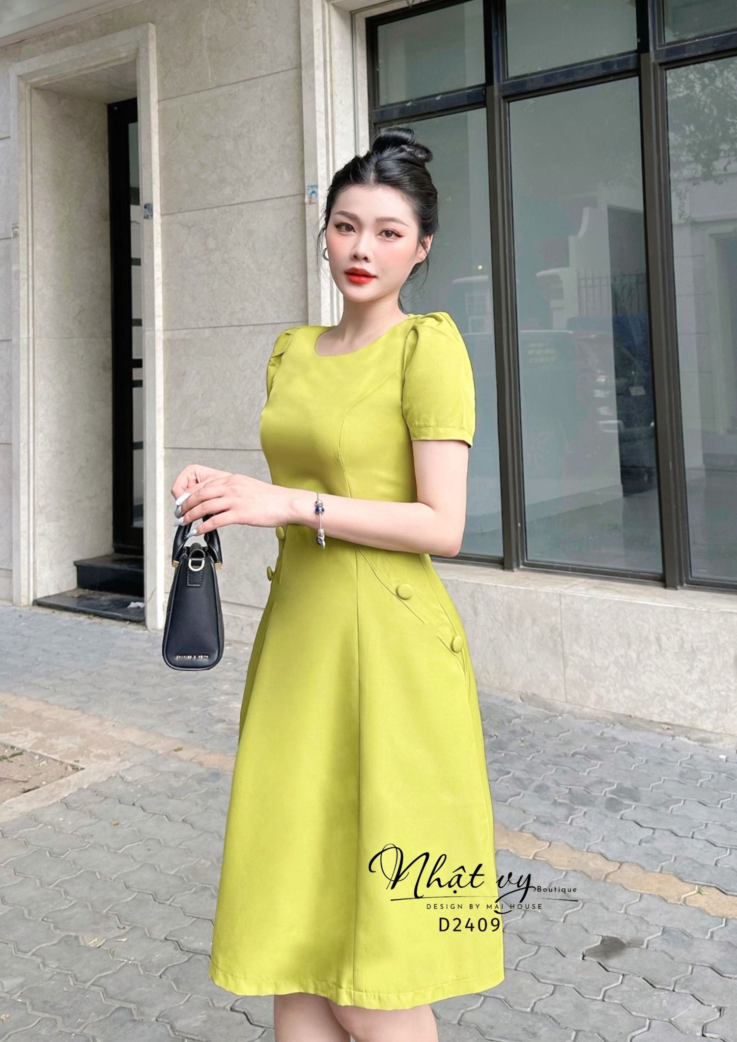 Đầm cổ tròn tay lửng phối cúc bọc - D2409