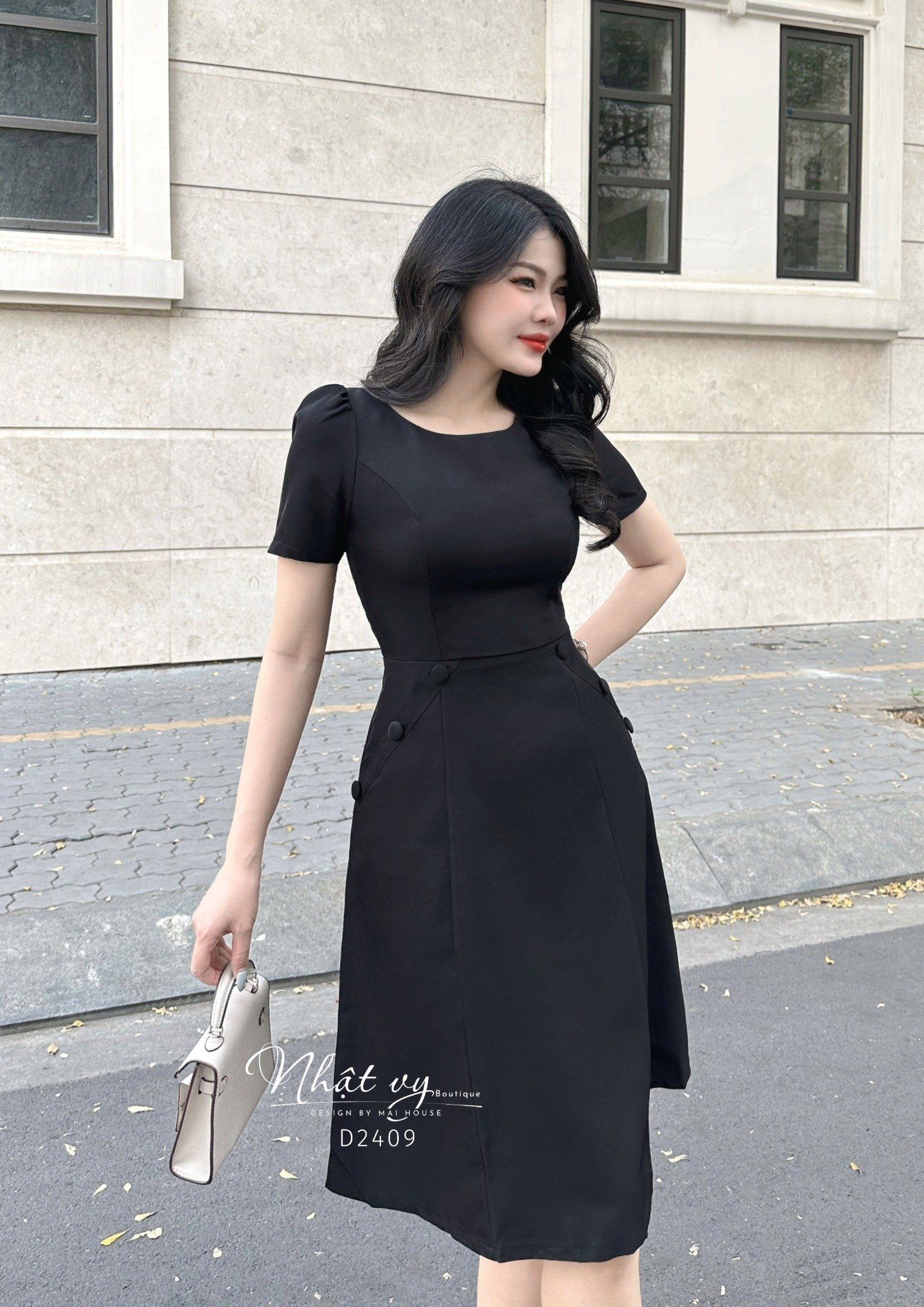 Đầm cổ tròn tay lửng phối cúc bọc - D2409