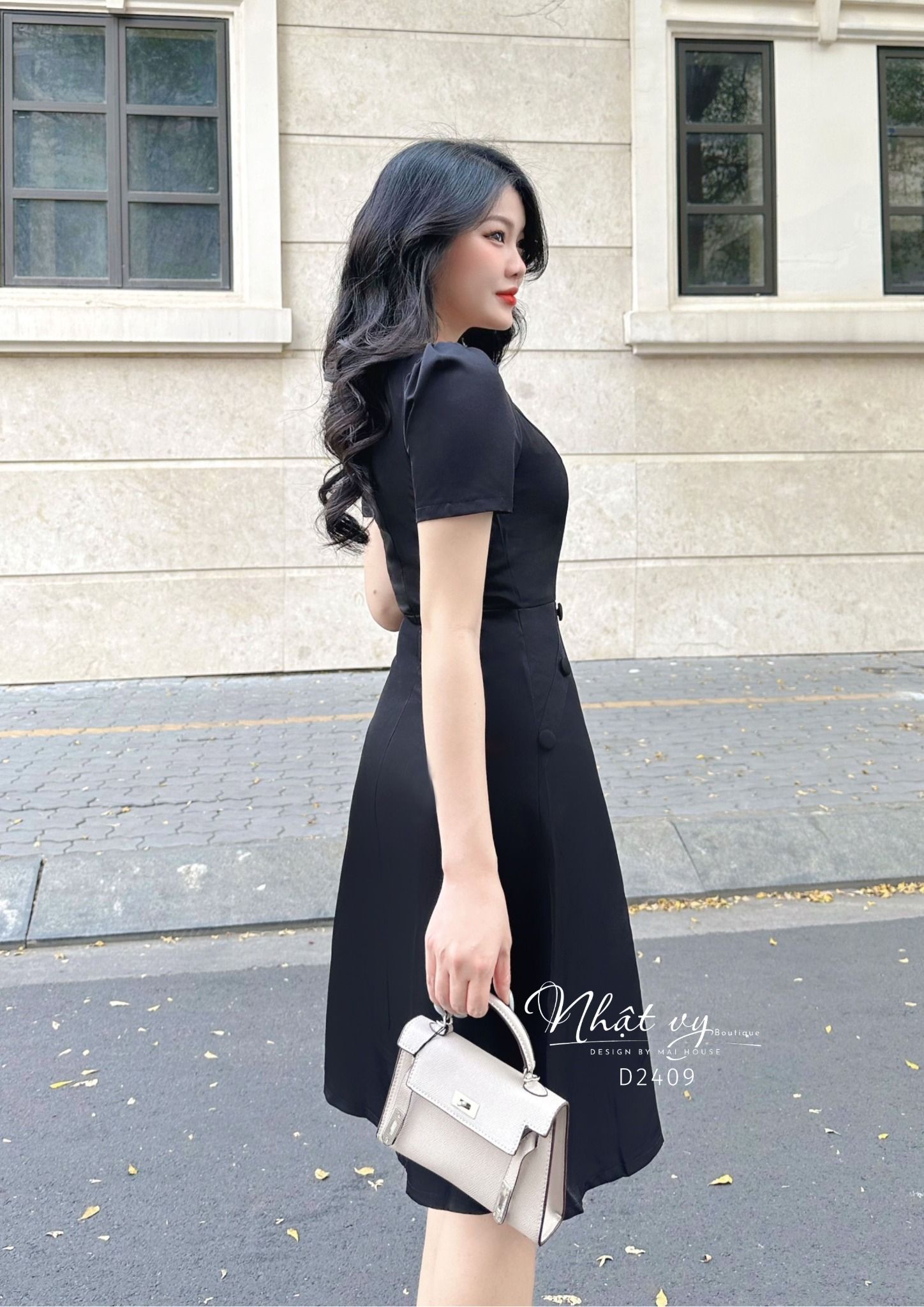 Đầm cổ tròn tay lửng phối cúc bọc - D2409