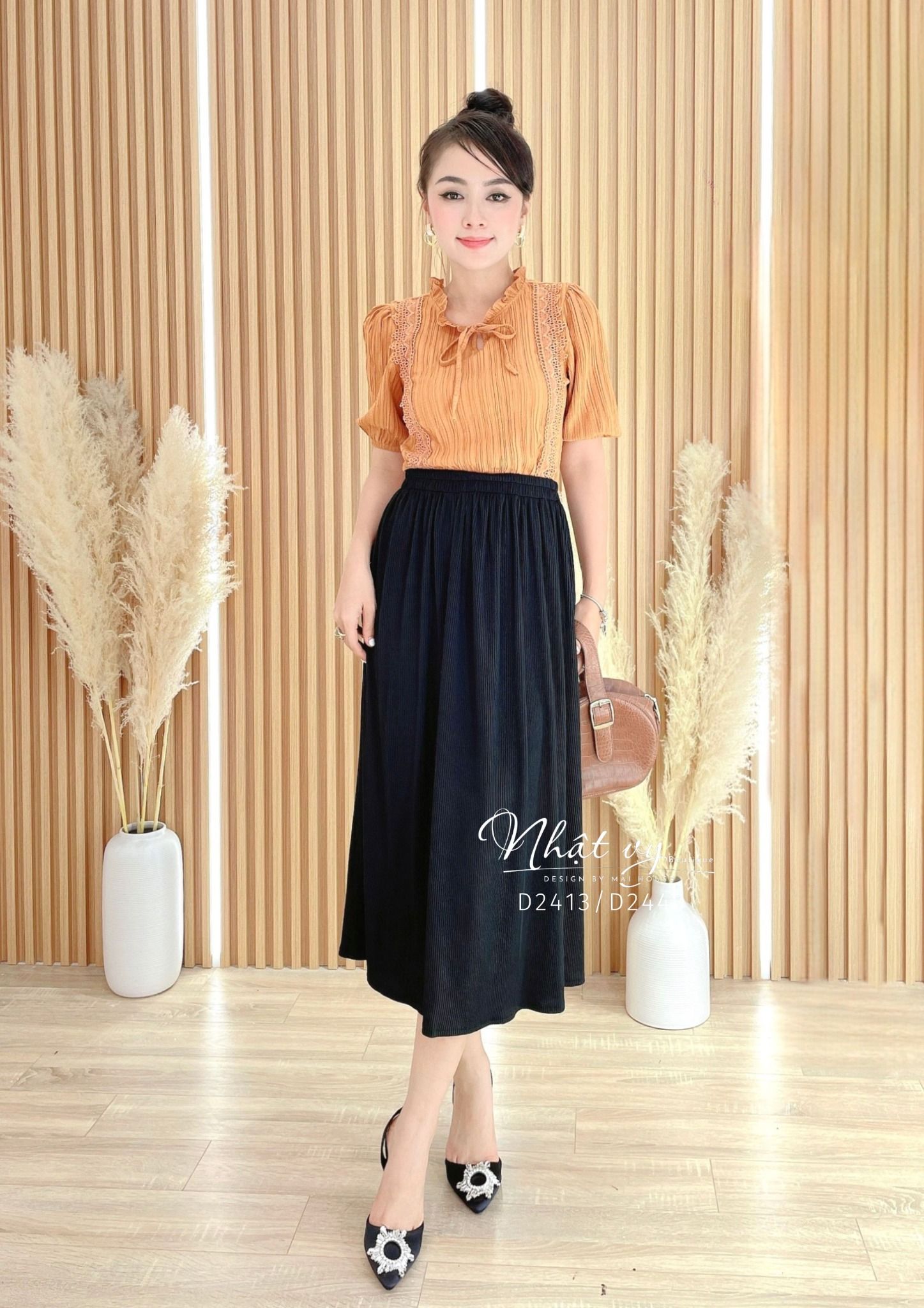 Áo viền ren dọc thắt nơ tay bo thun - D2413