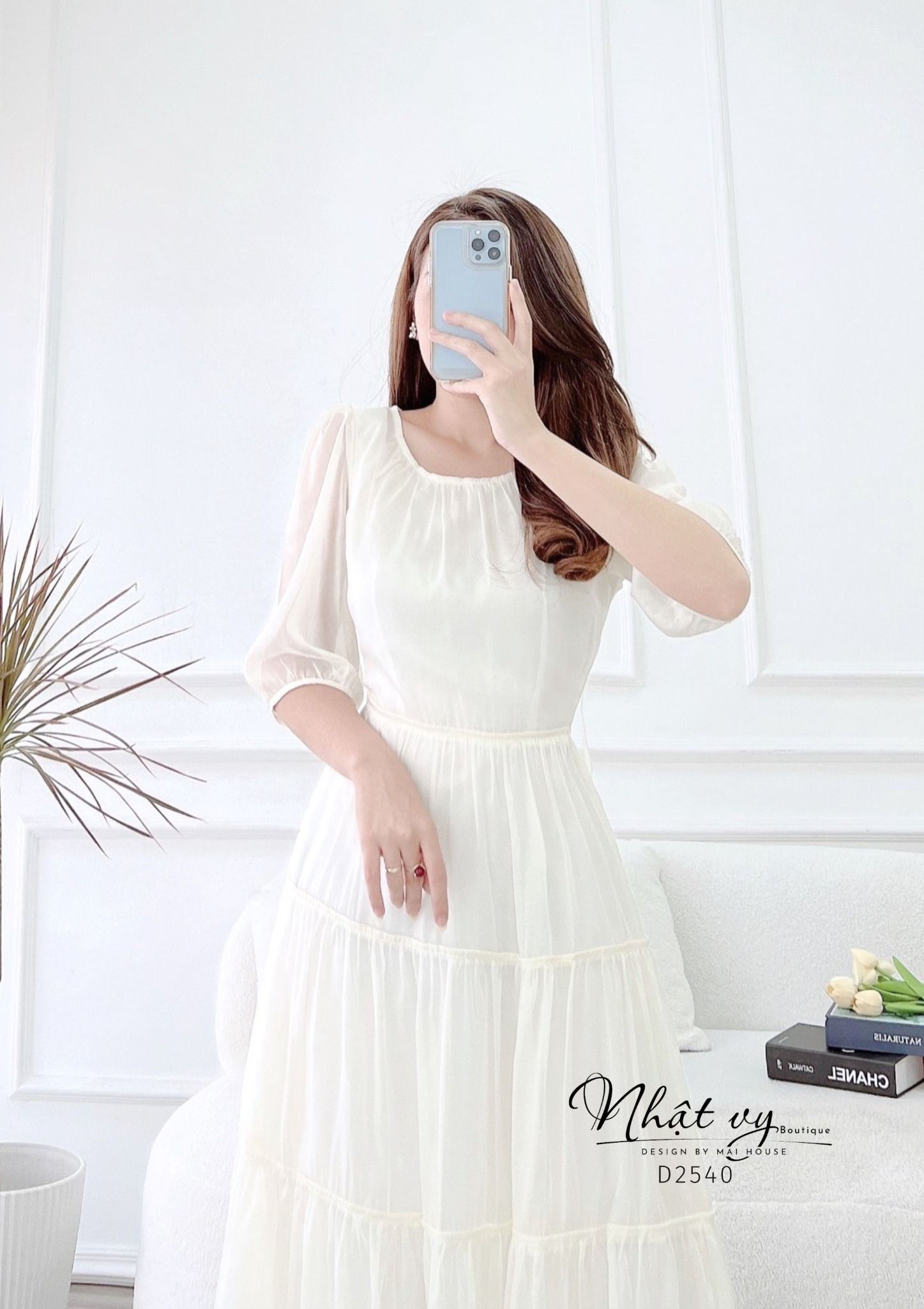 Đầm tầng nhún ngực cổ tròn thắt nơ lưng - D2540