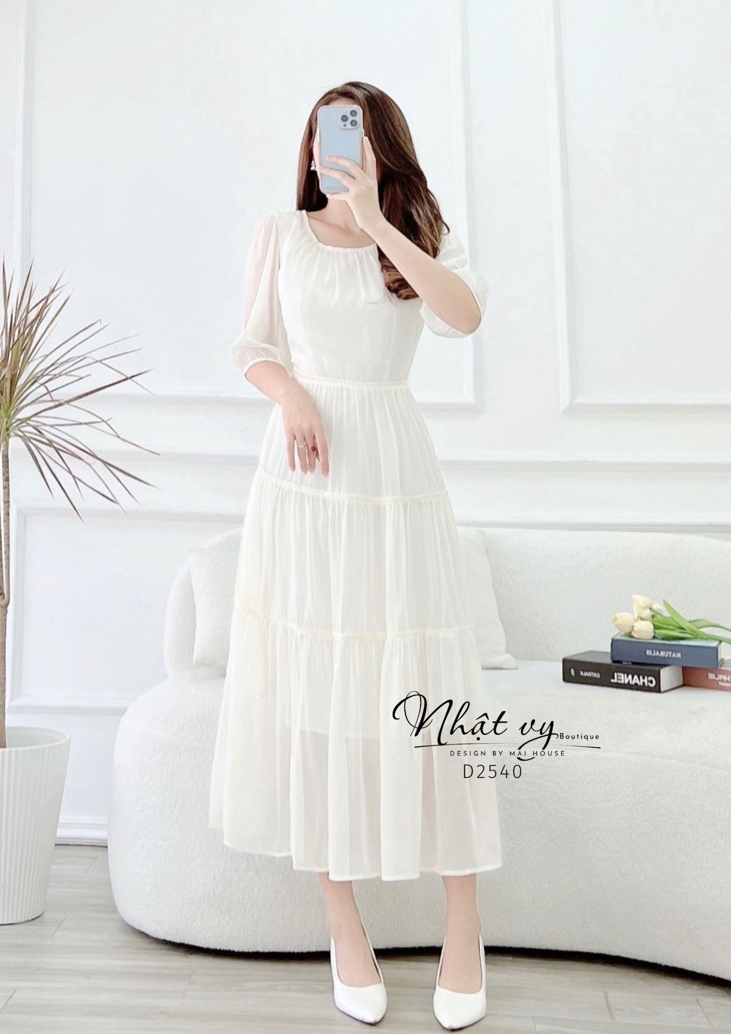 Đầm tầng nhún ngực cổ tròn thắt nơ lưng - D2540