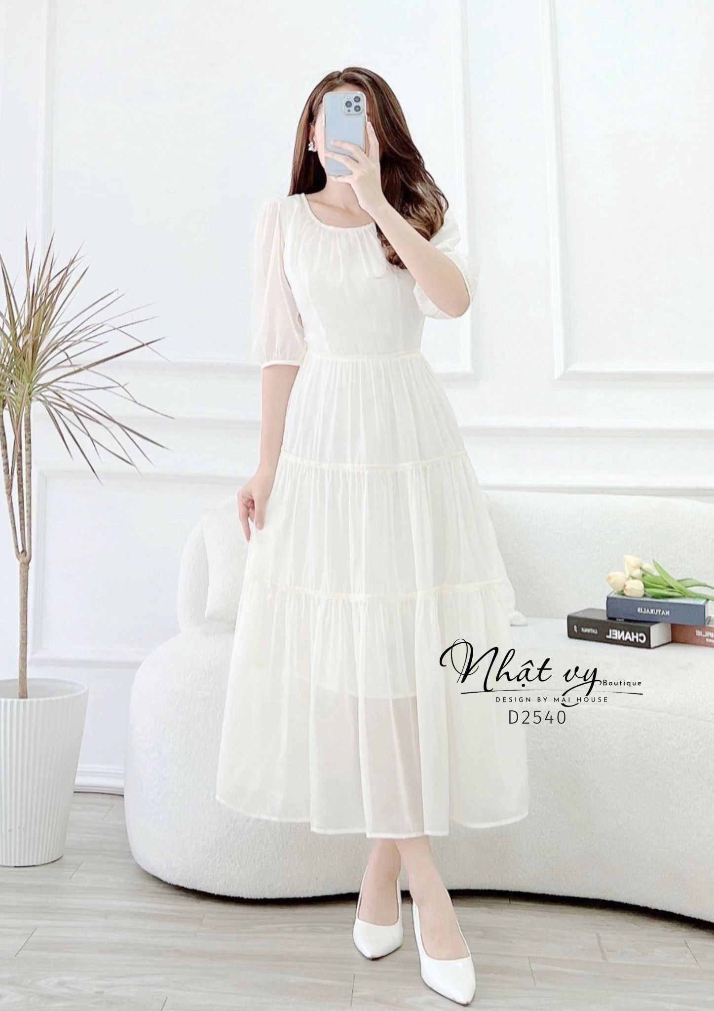 Đầm tầng nhún ngực cổ tròn thắt nơ lưng - D2540