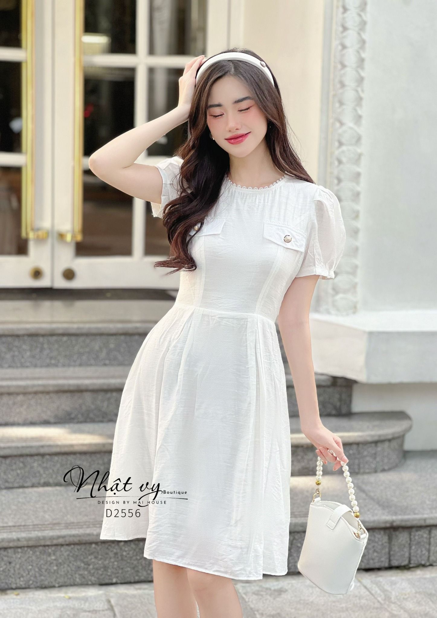 Đầm cổ tròn viền ren đính túi giả tay phồng - D2556