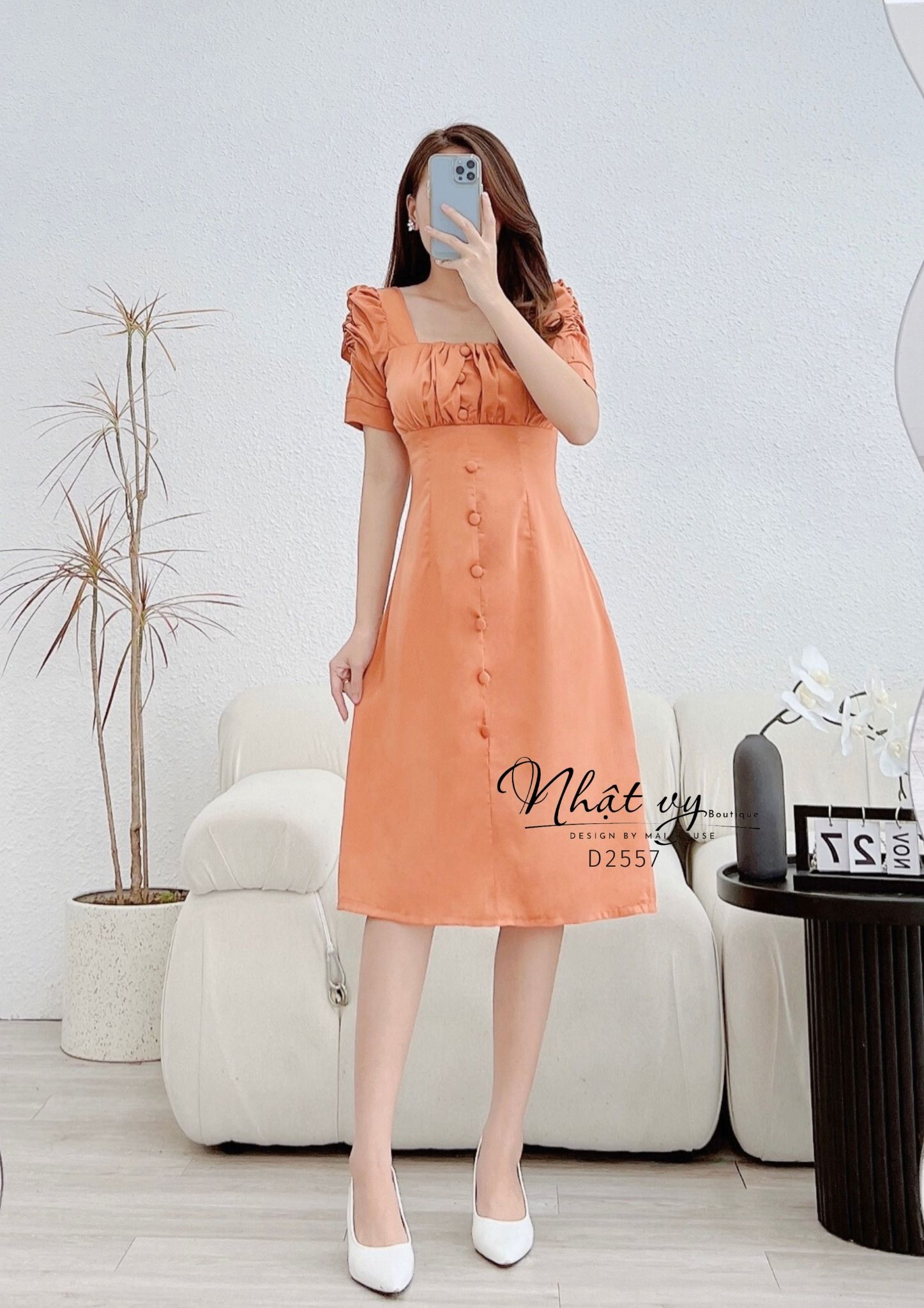Đầm nhún ngực tay cách điệu đính cúc bọc - D2557