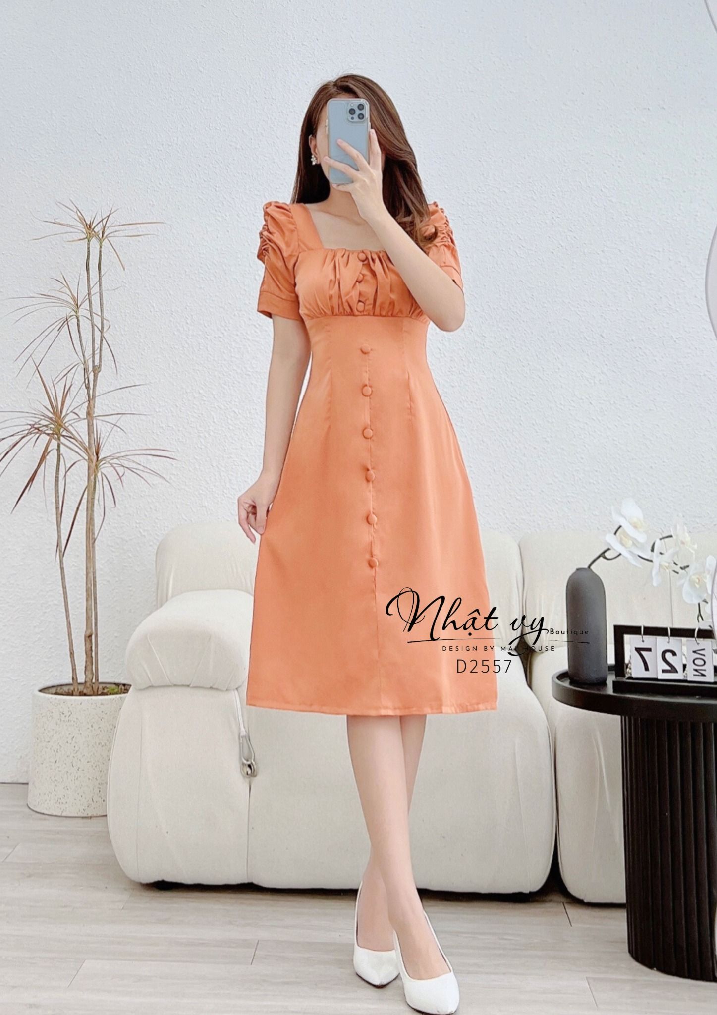 Đầm nhún ngực tay cách điệu đính cúc bọc - D2557