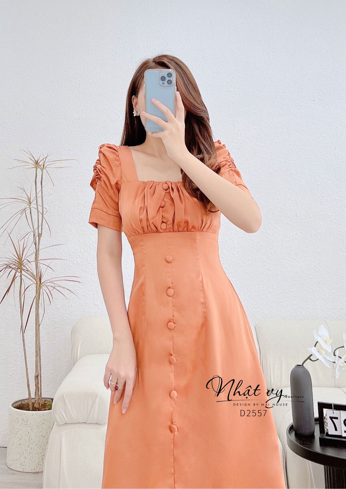 Đầm nhún ngực tay cách điệu đính cúc bọc - D2557