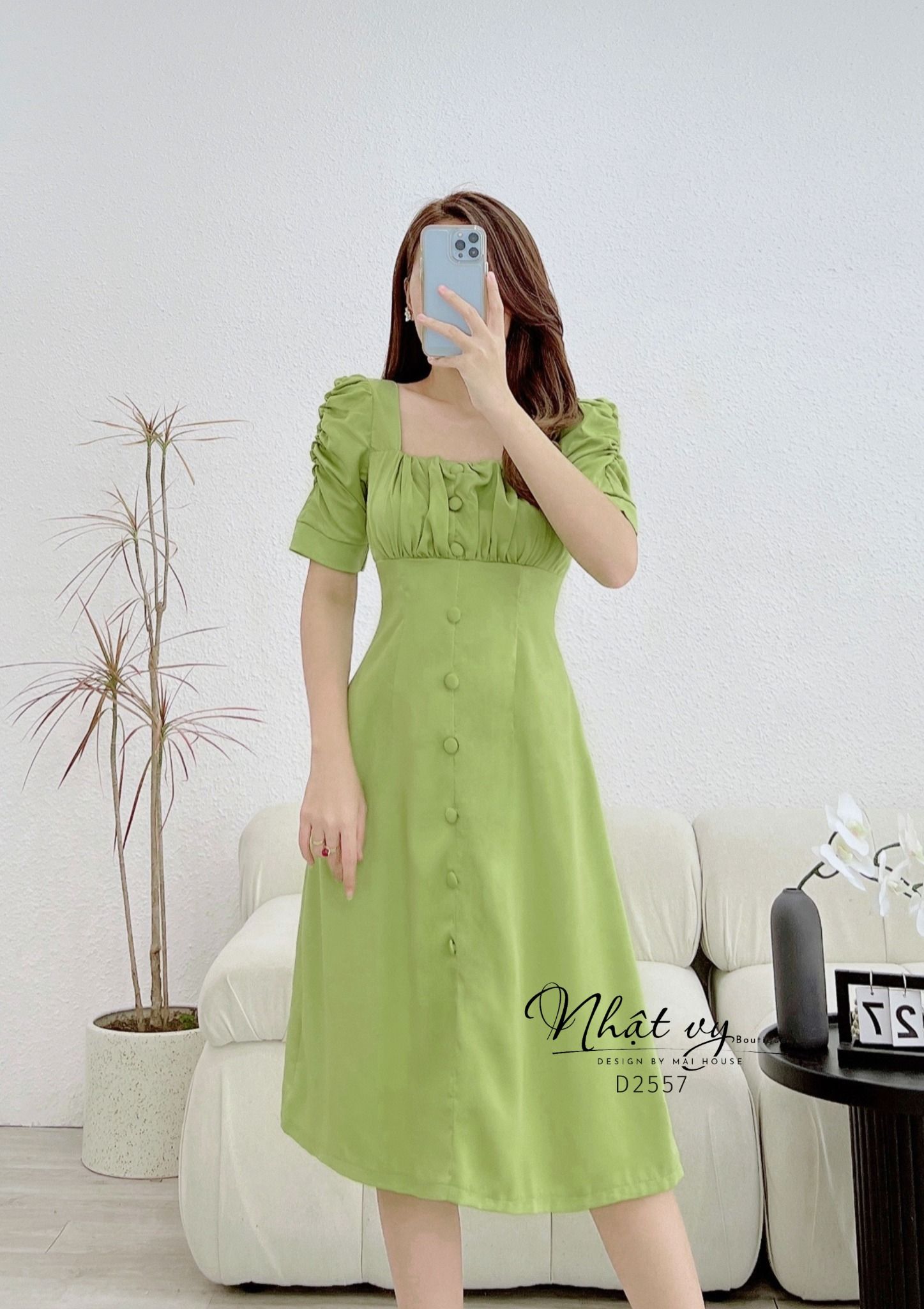 Đầm nhún ngực tay cách điệu đính cúc bọc - D2557