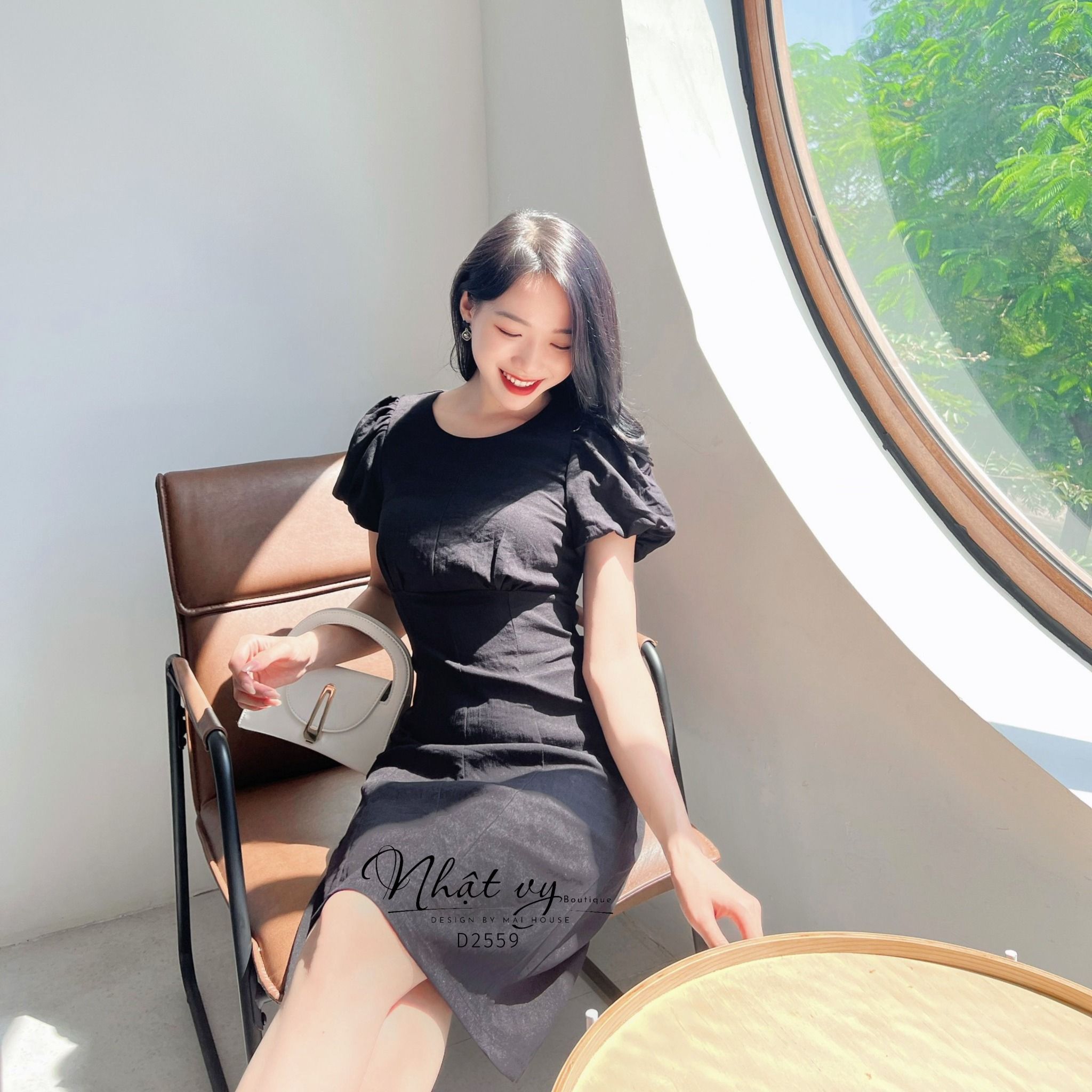Đầm nhún ngực cổ tròn tay bí dáng ôm - D2559
