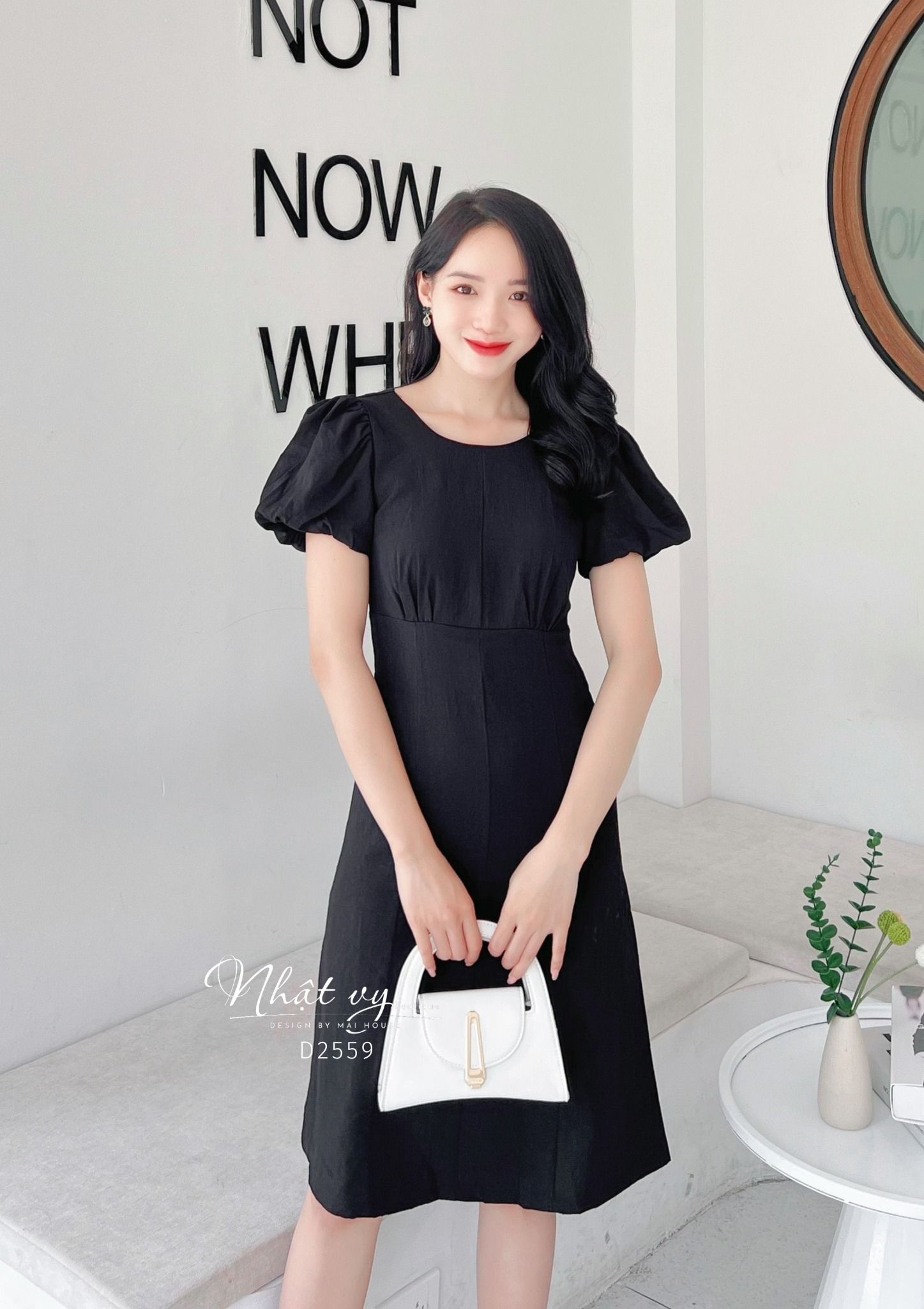 Đầm nhún ngực cổ tròn tay bí dáng ôm - D2559