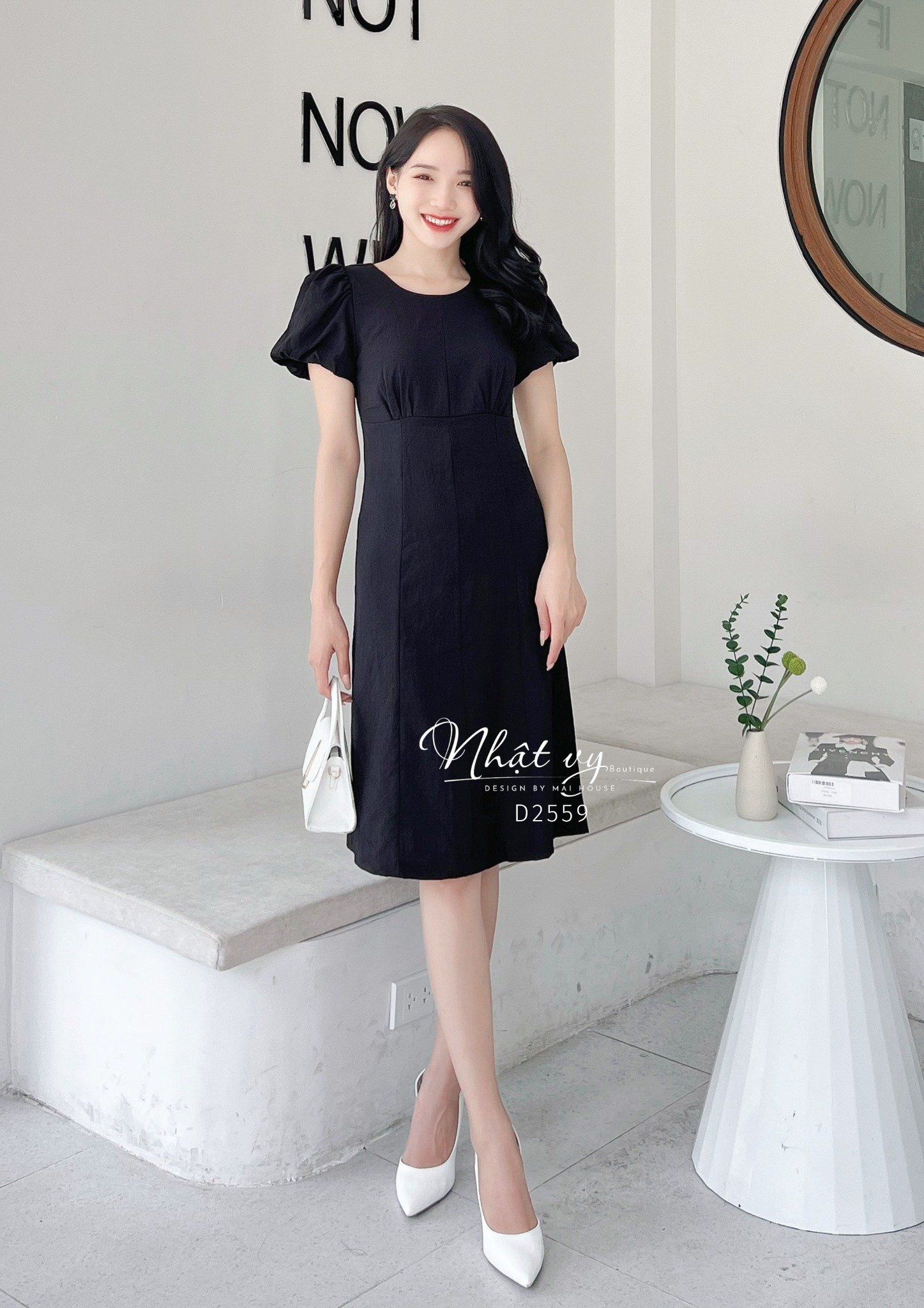 Đầm nhún ngực cổ tròn tay bí dáng ôm - D2559