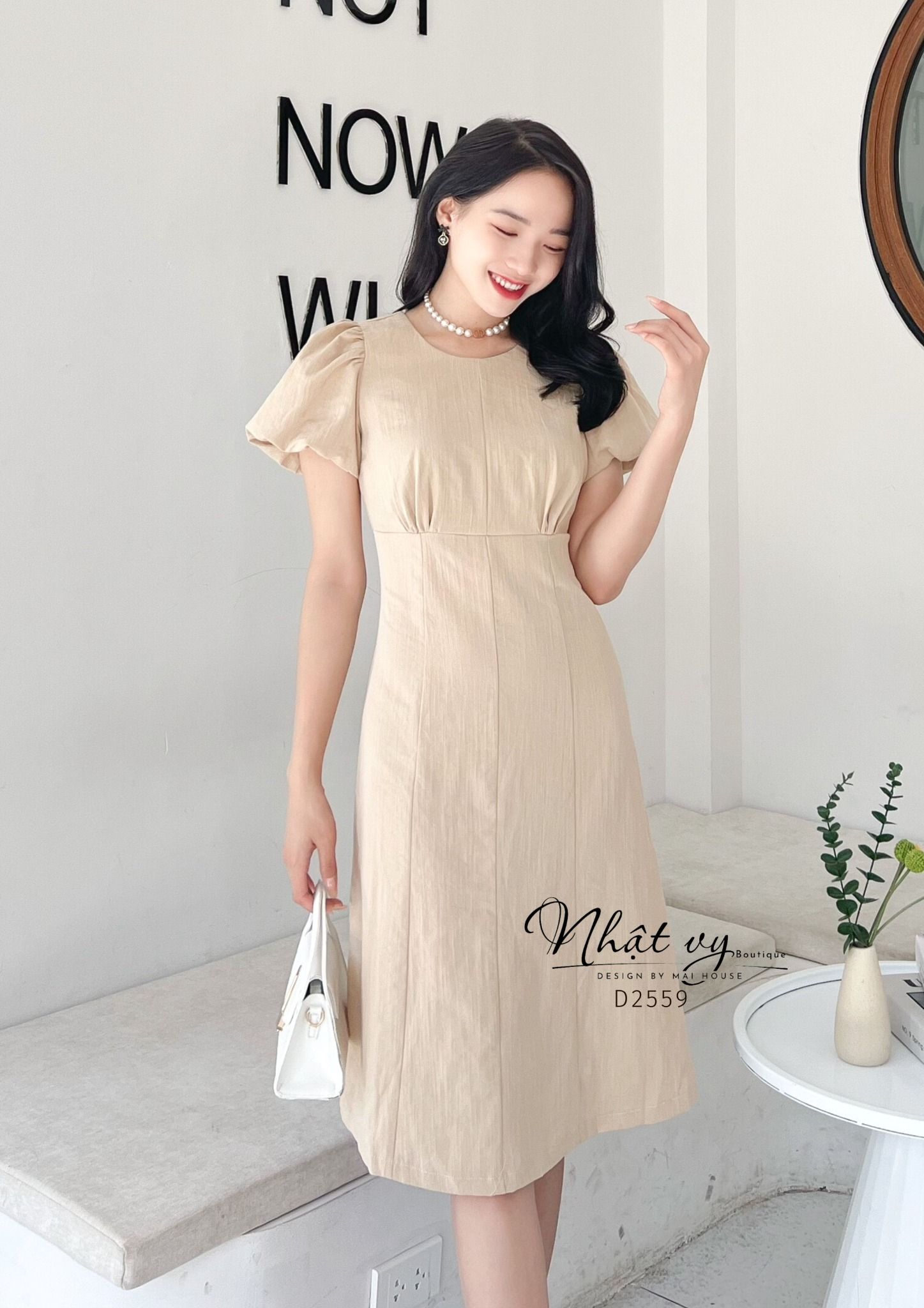Đầm nhún ngực cổ tròn tay bí dáng ôm - D2559