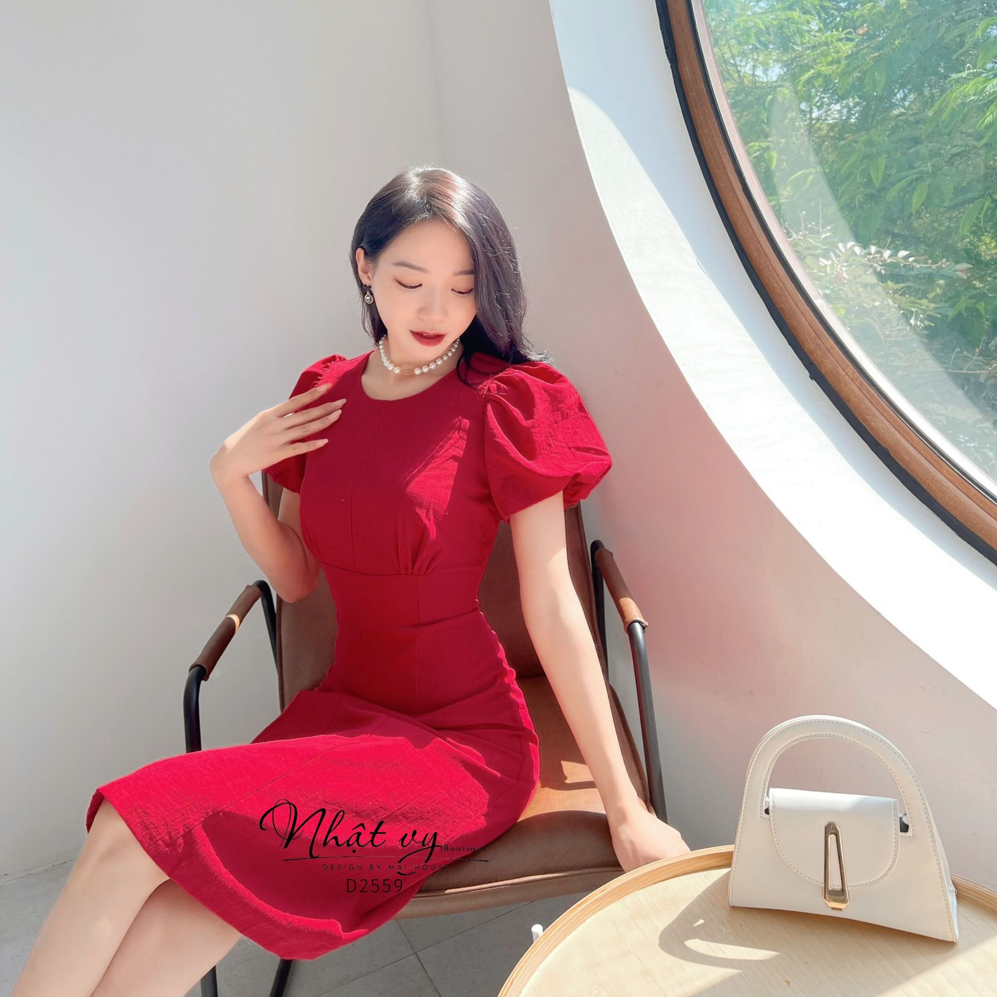 Đầm nhún ngực cổ tròn tay bí dáng ôm - D2559