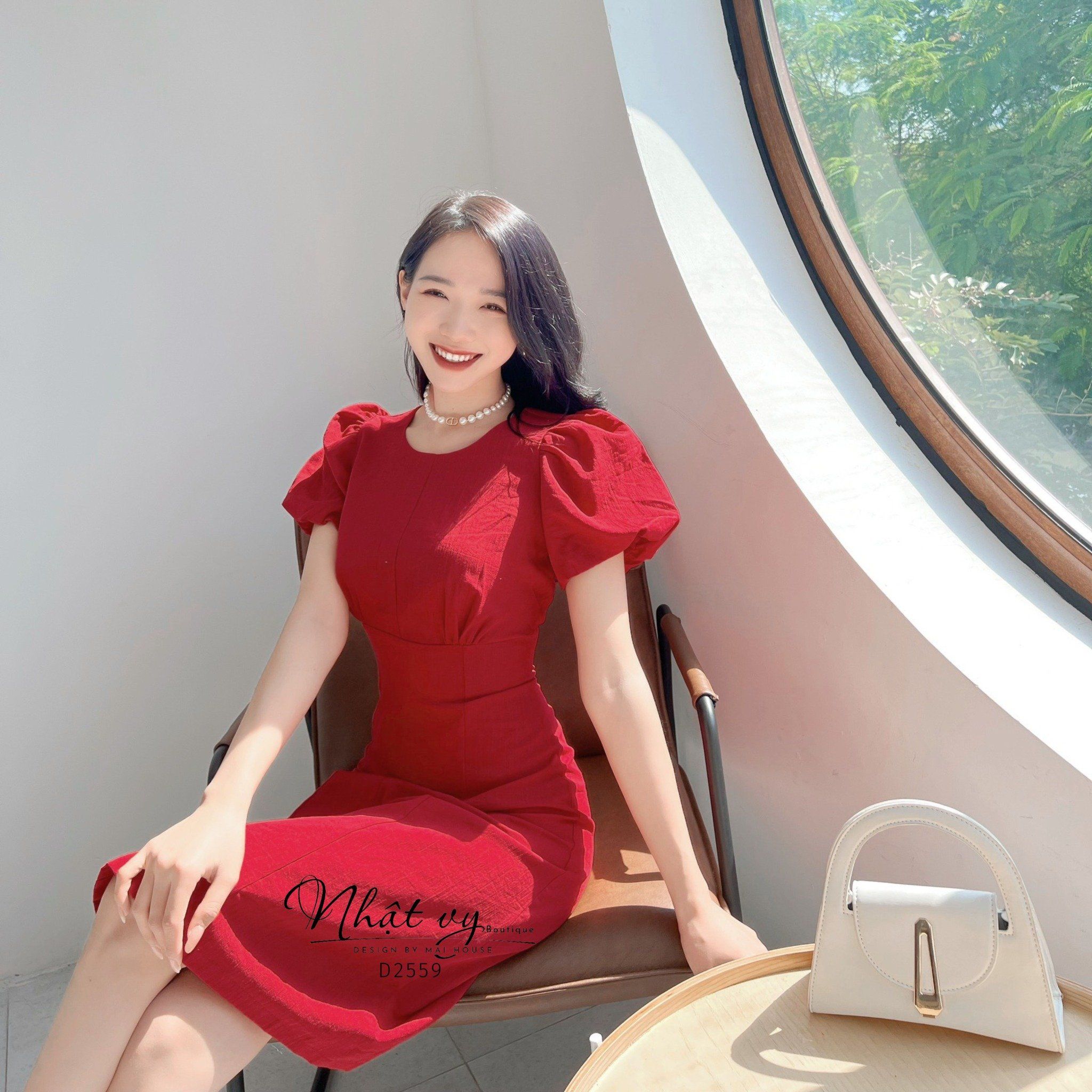 Đầm nhún ngực cổ tròn tay bí dáng ôm - D2559